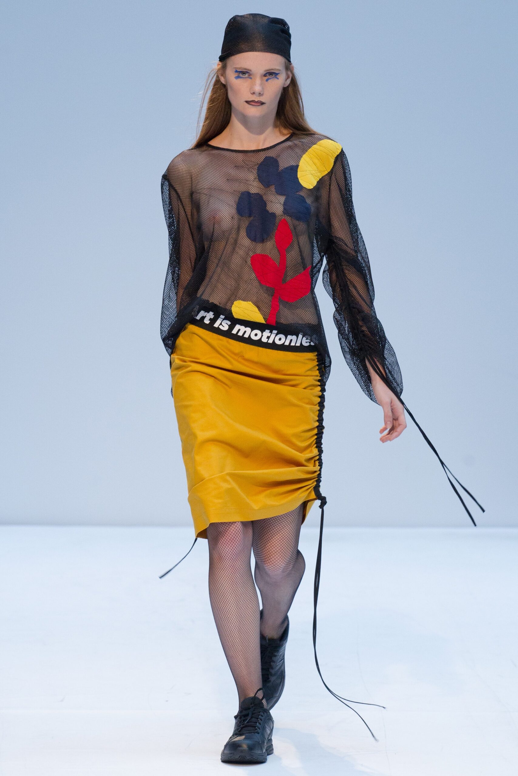 black mesh top with yellow skirt
