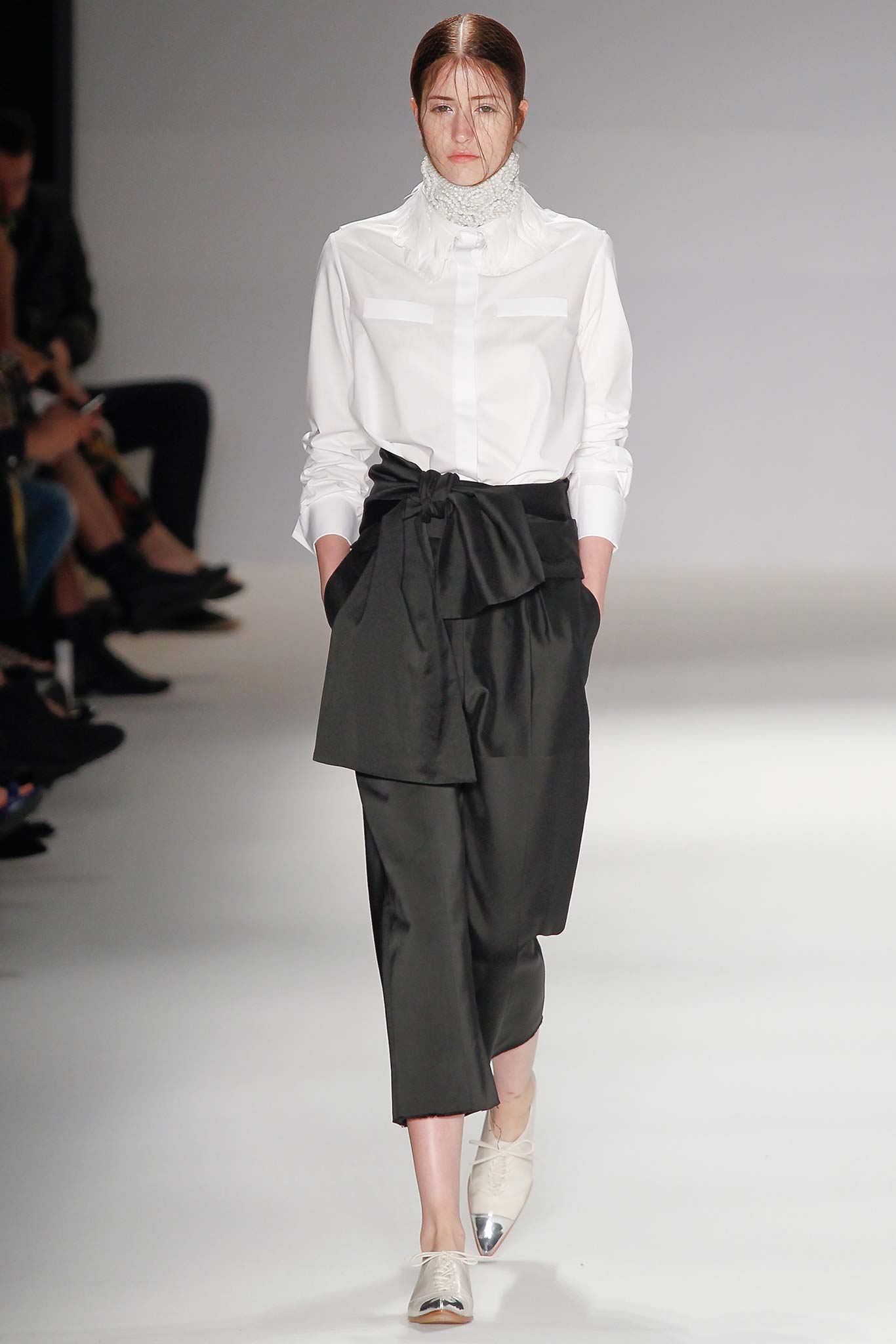 white fitted shirt and black pants