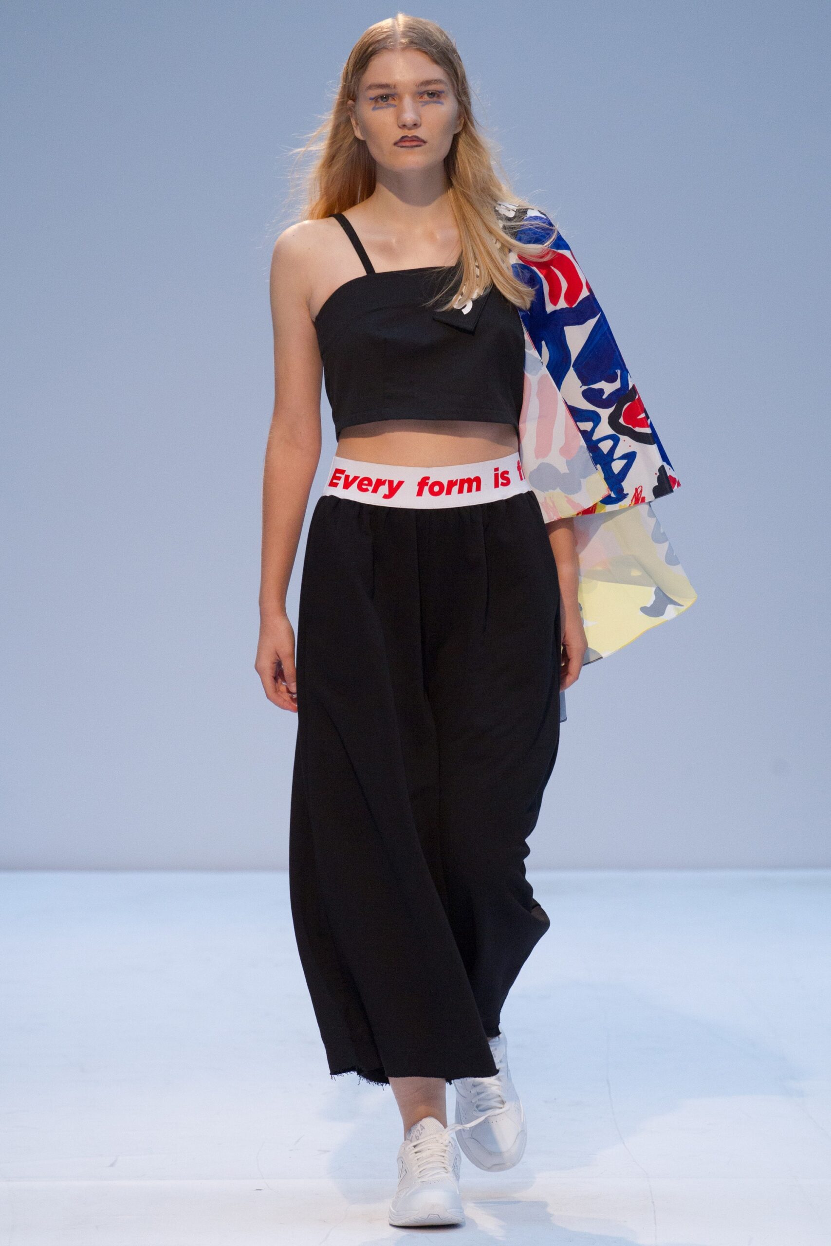 black crop-top and relaxed pants