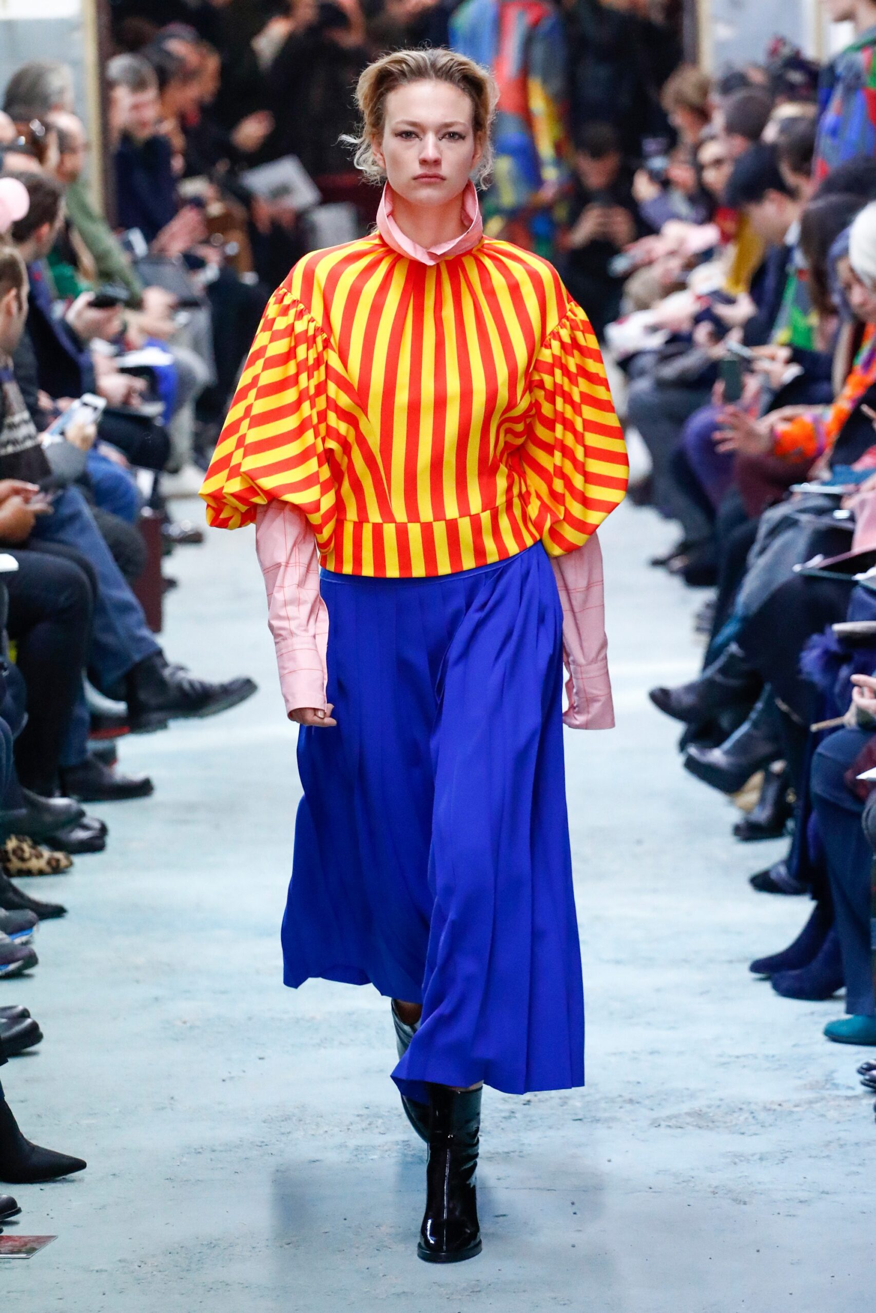 red and yellow striped top with blue pants