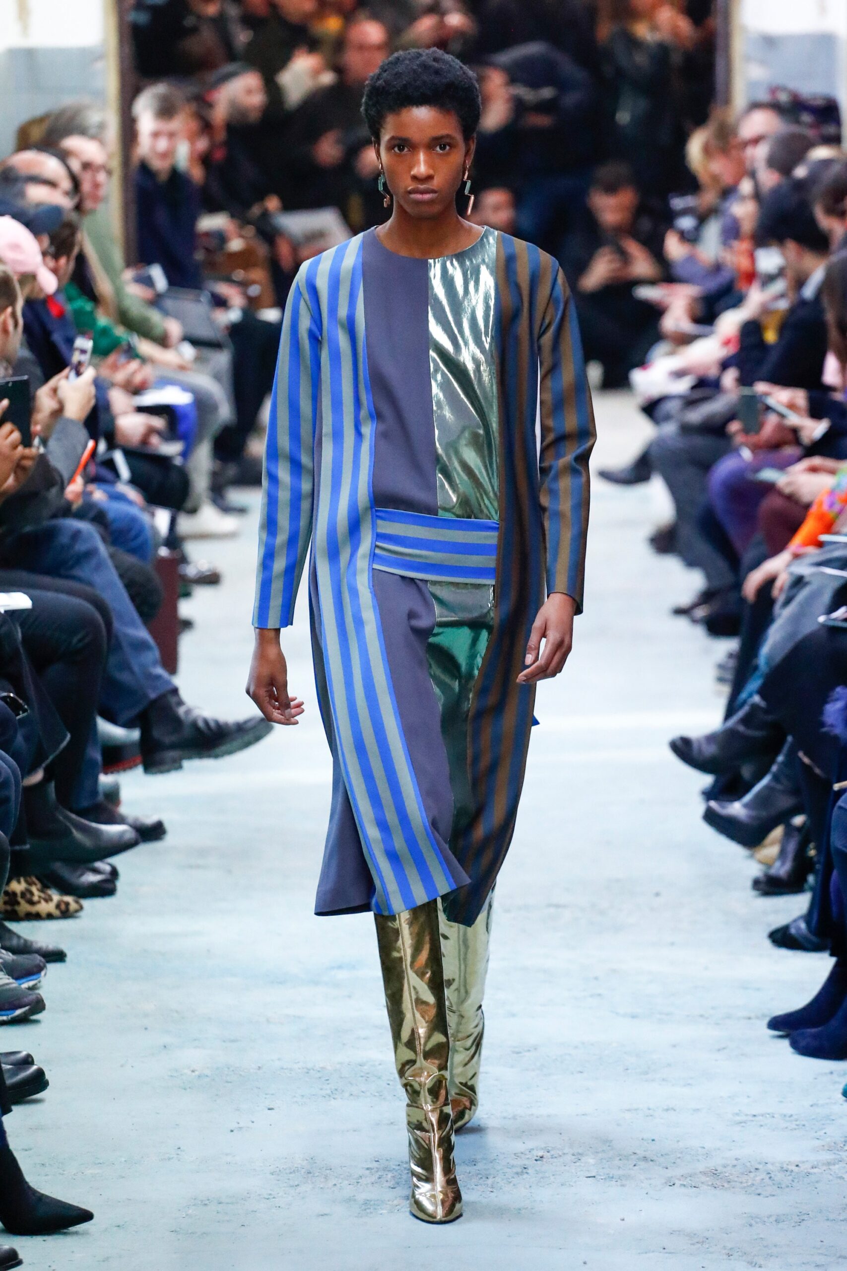 blue and green striped midi dress with gold boots