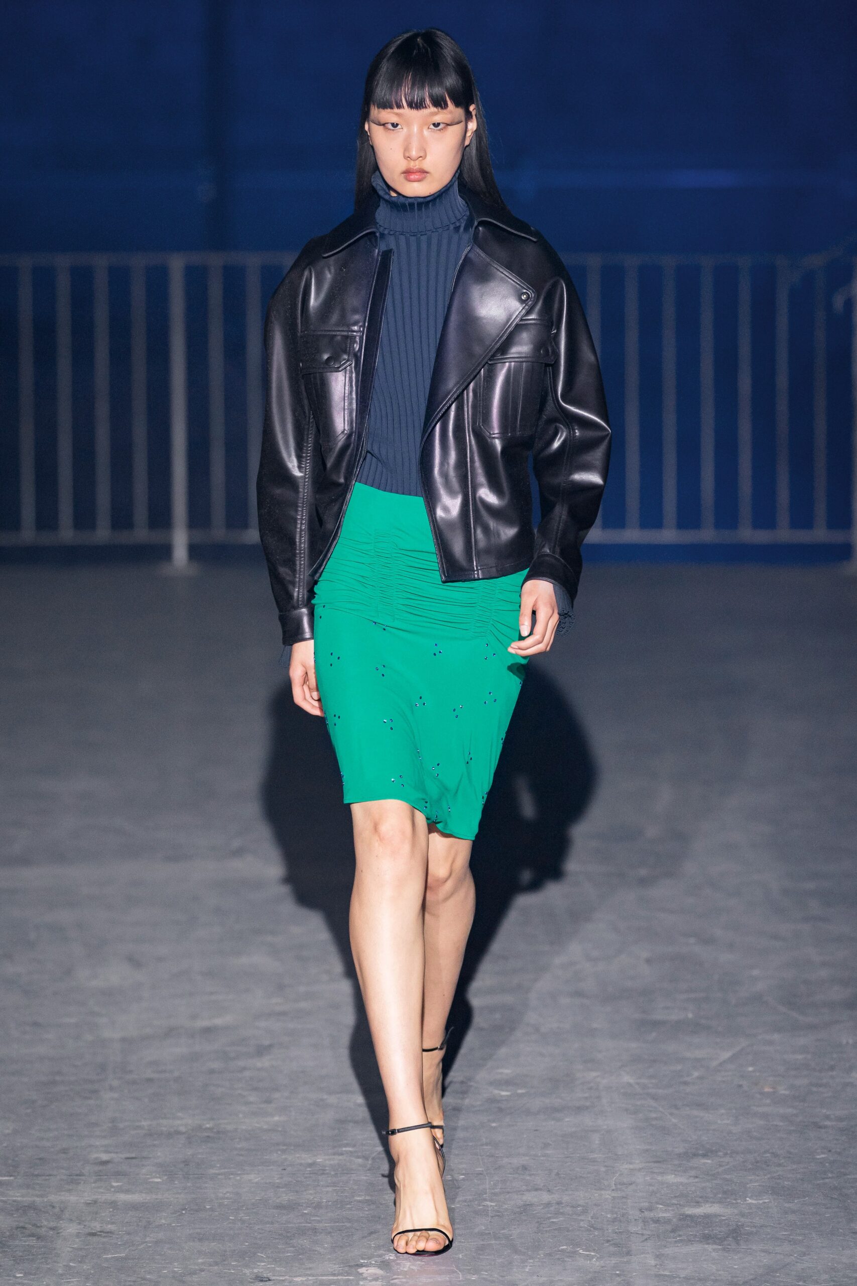 black leather jacket green pencil skirt