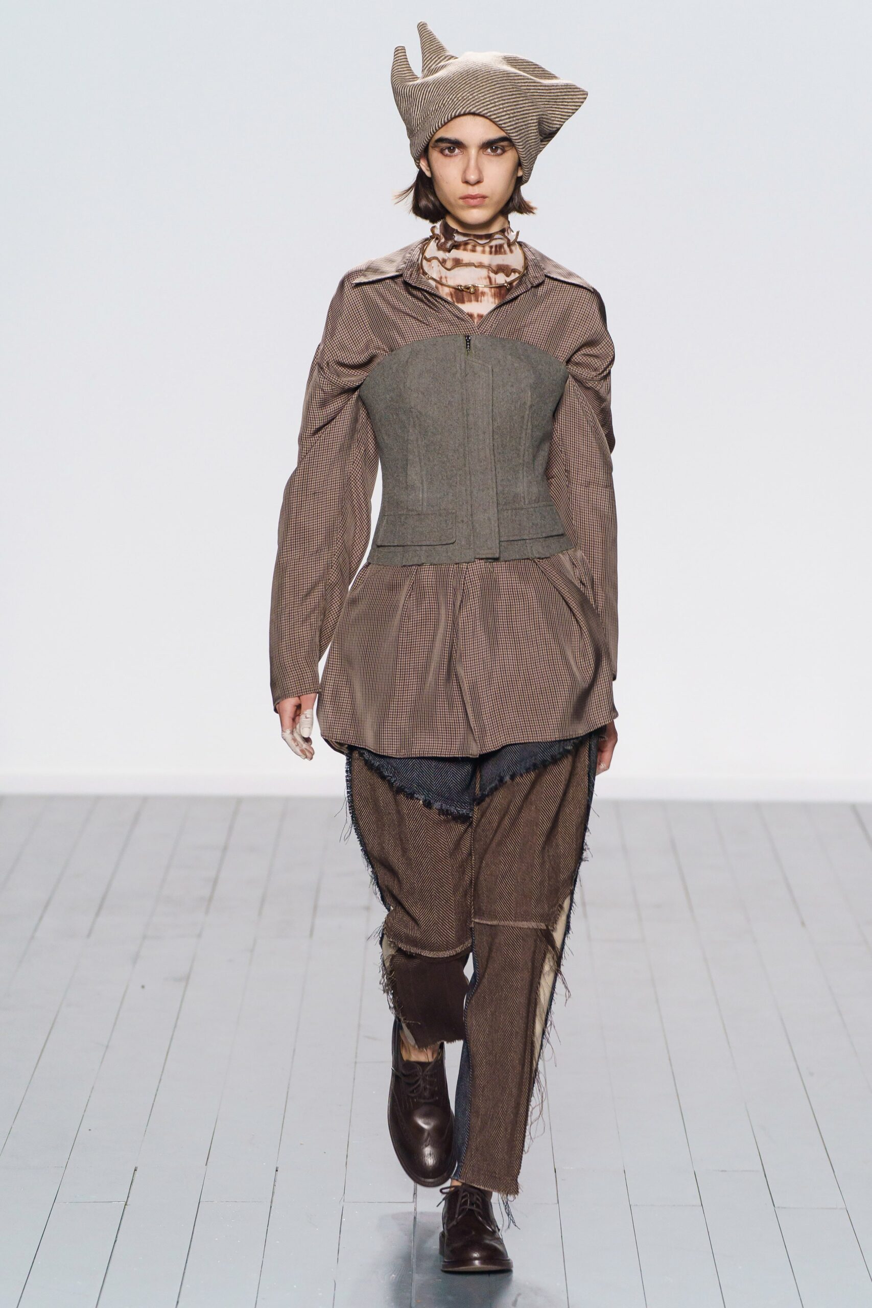 brown fitted jacket with relaxed pants