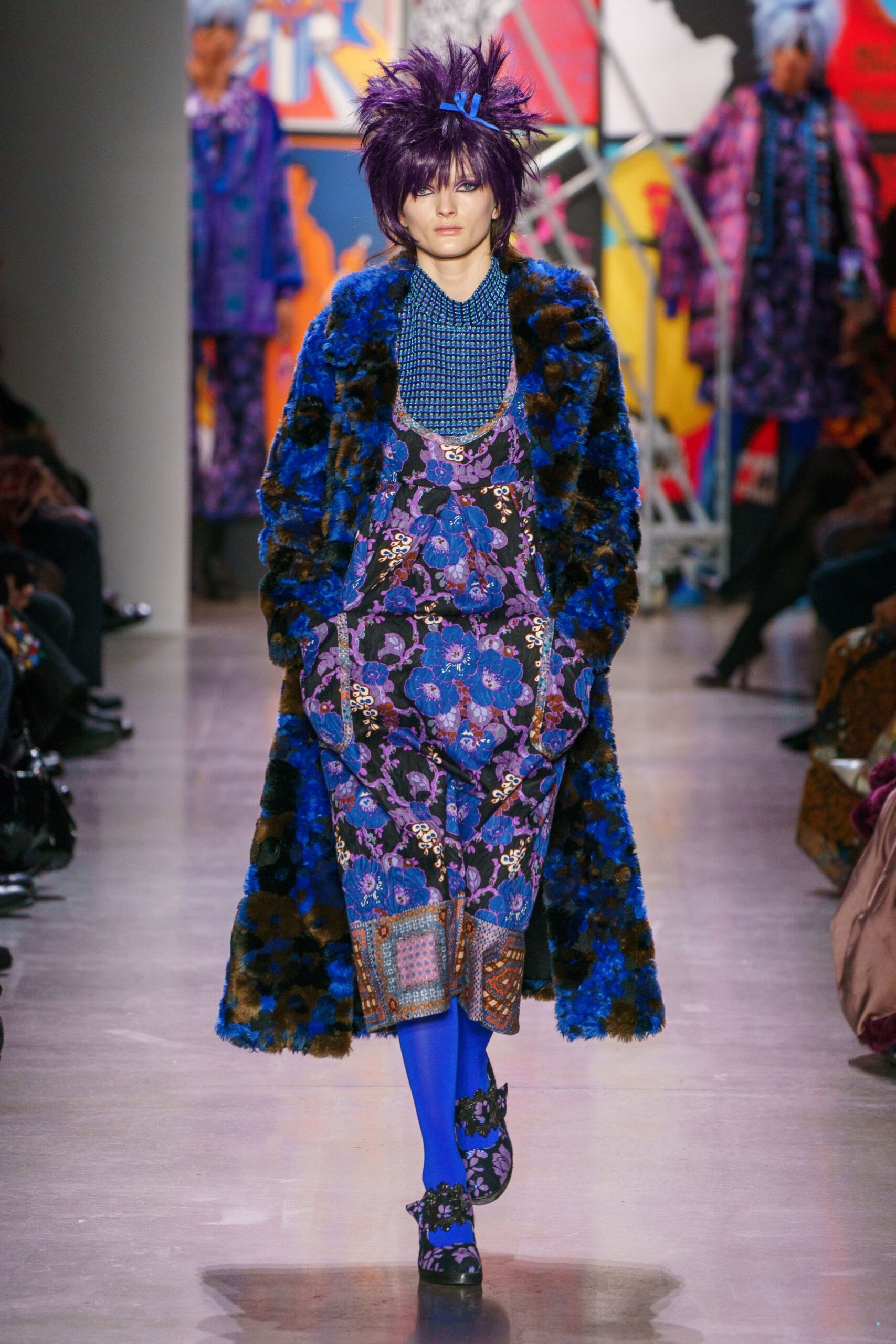 blue faux-fur coat with fitted dress