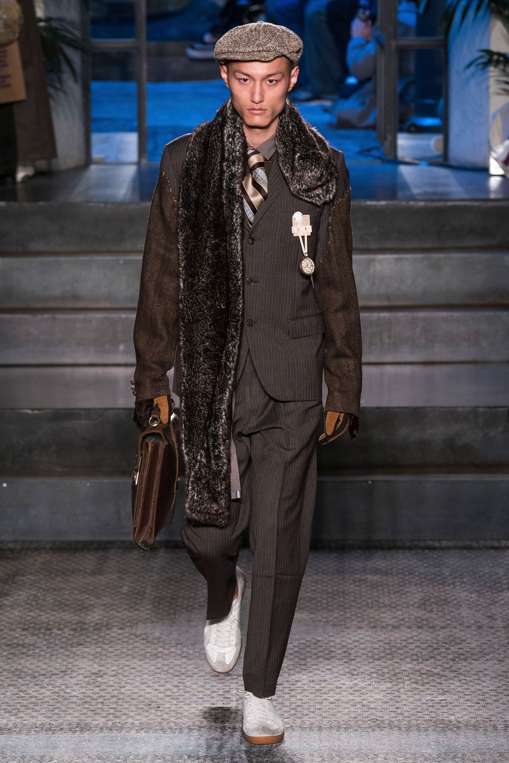 brown tailored suit with scarf