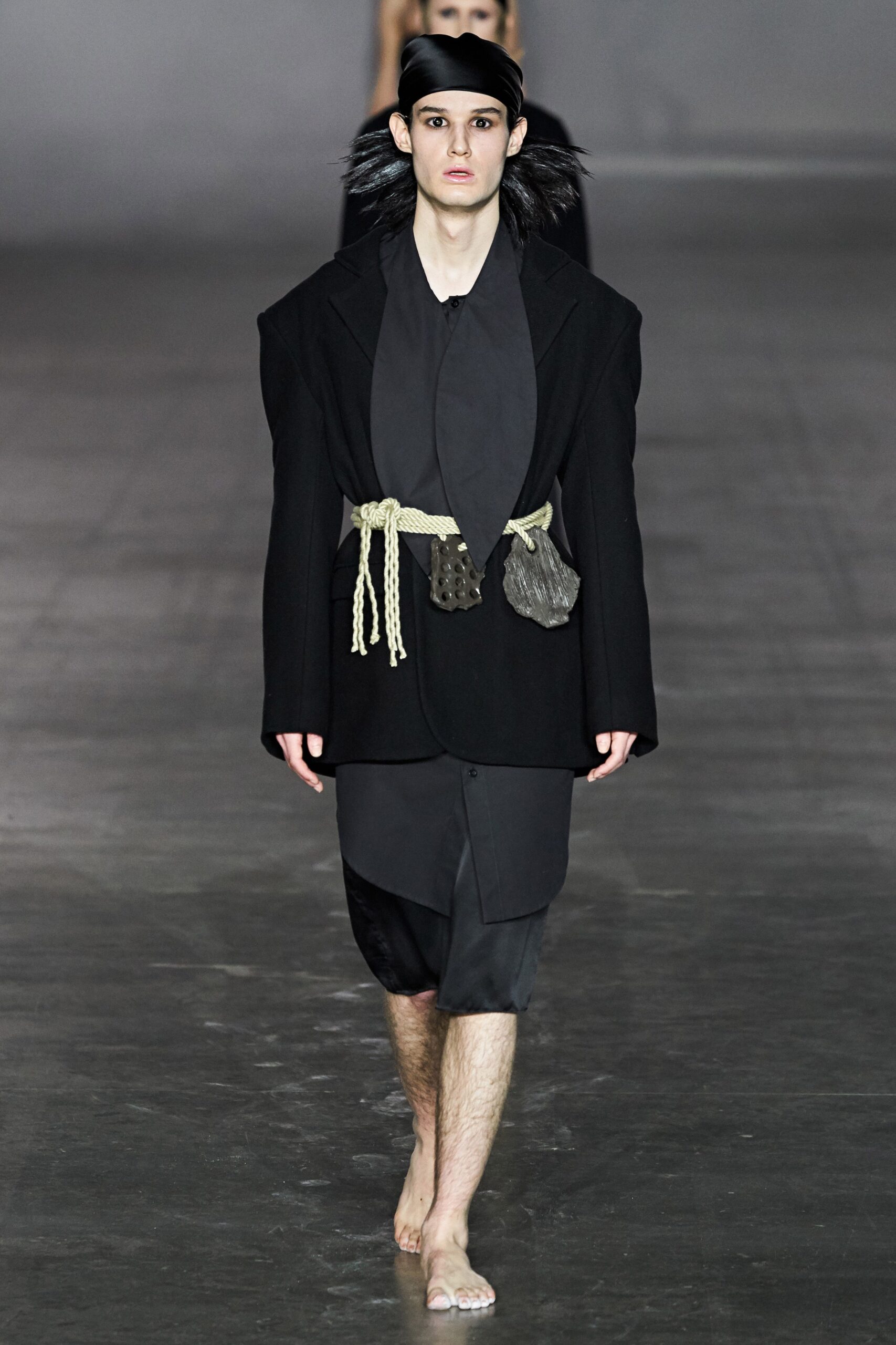 oversized black jacket and fitted dress