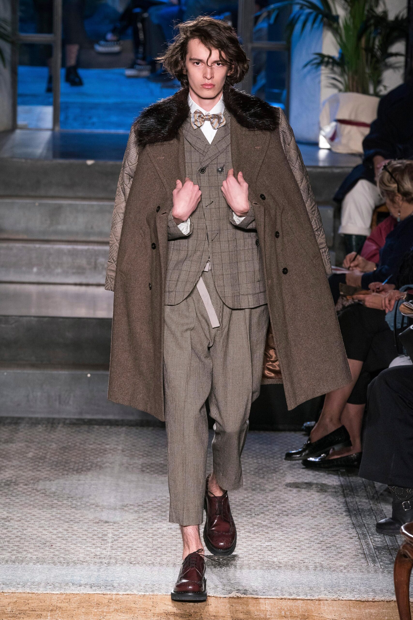 brown wool coat with gray suit