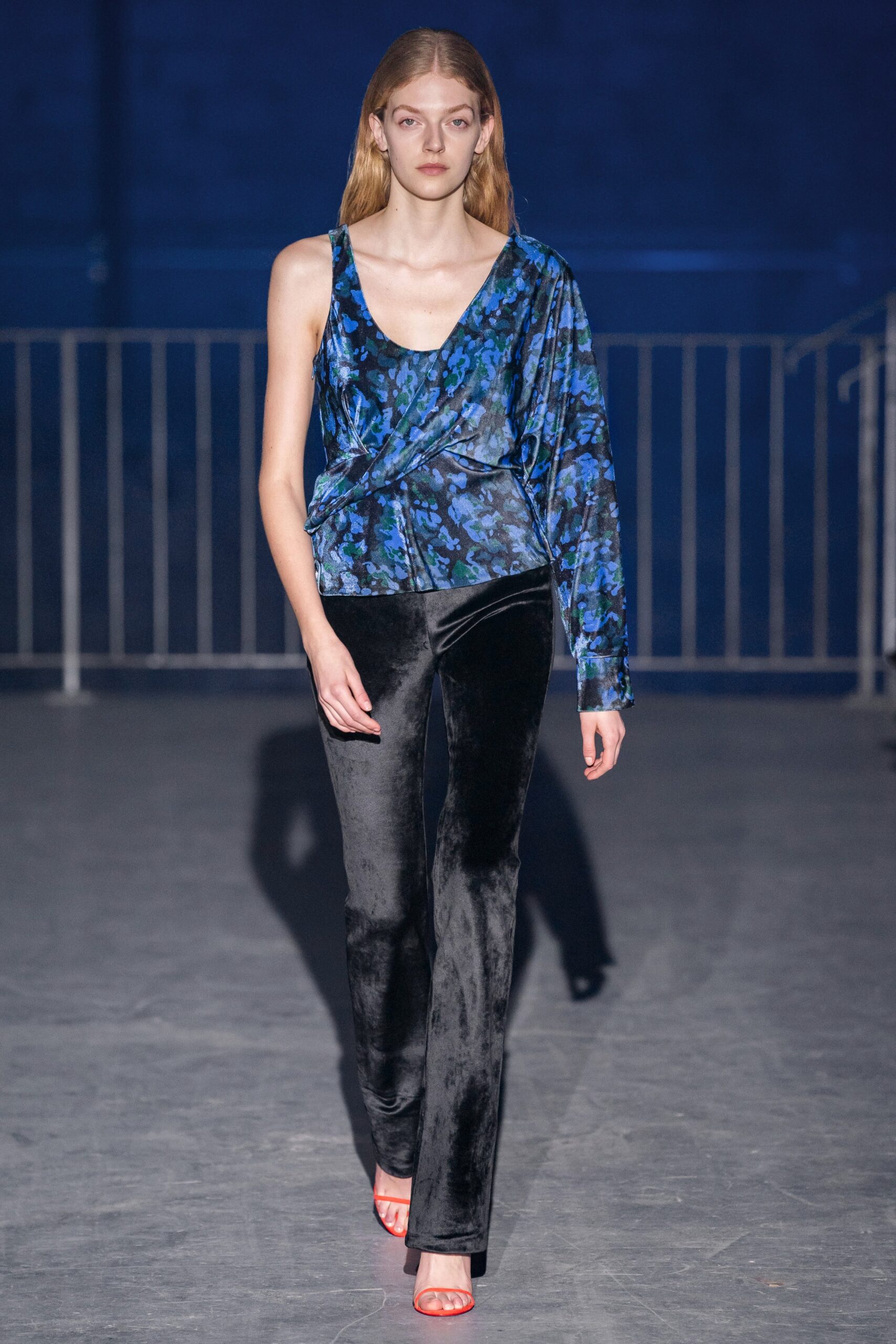 blue velvet fitted top with black pants