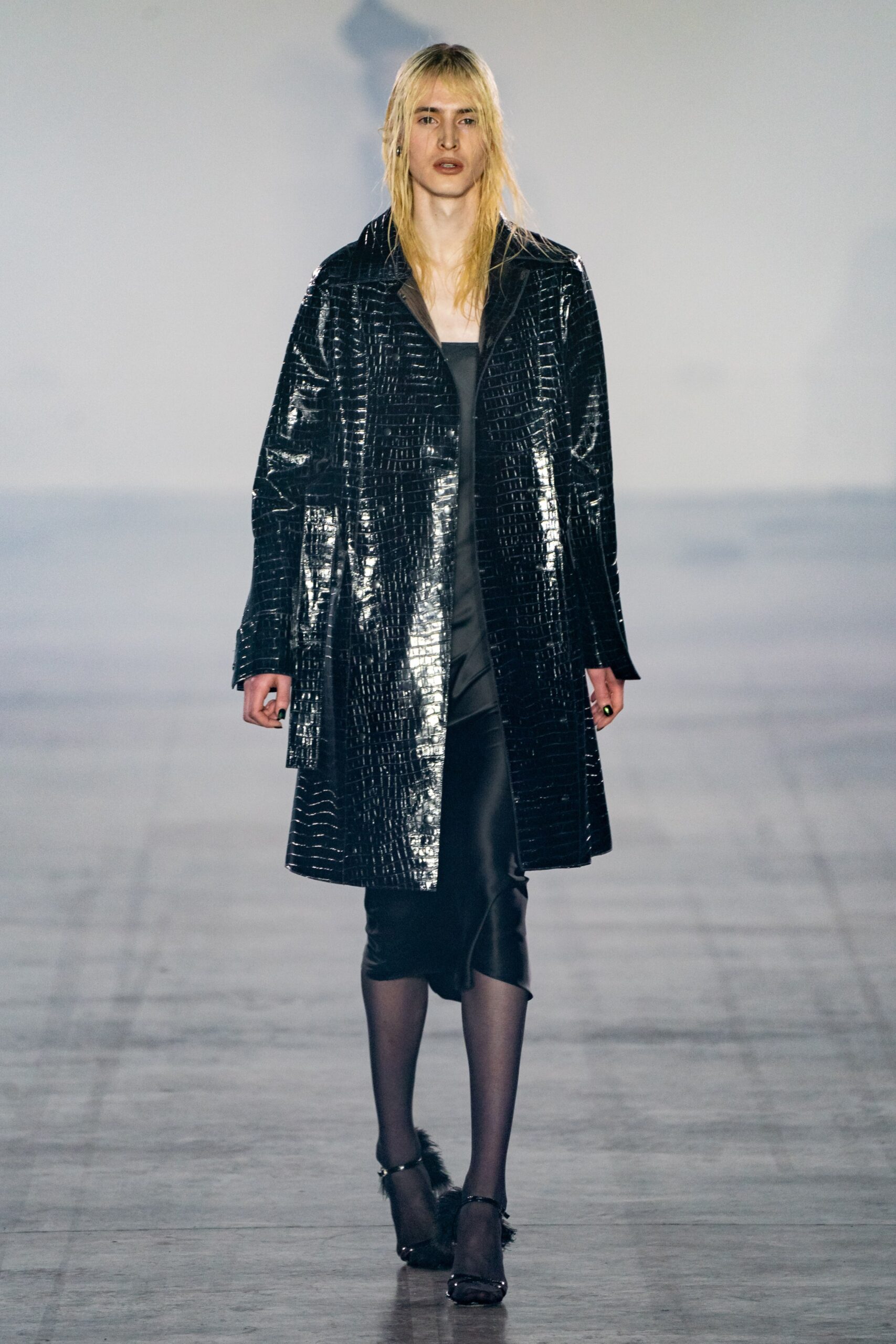 black vinyl long-sleeve collared relaxed textured shiny coat