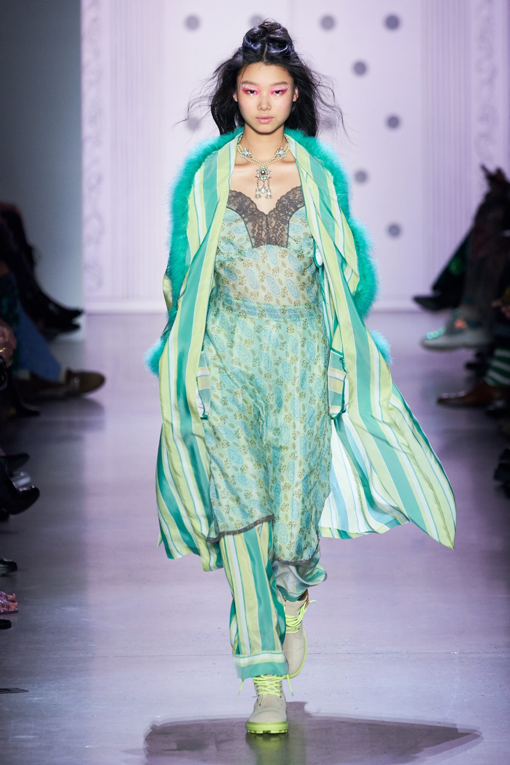 green striped coat with printed pants