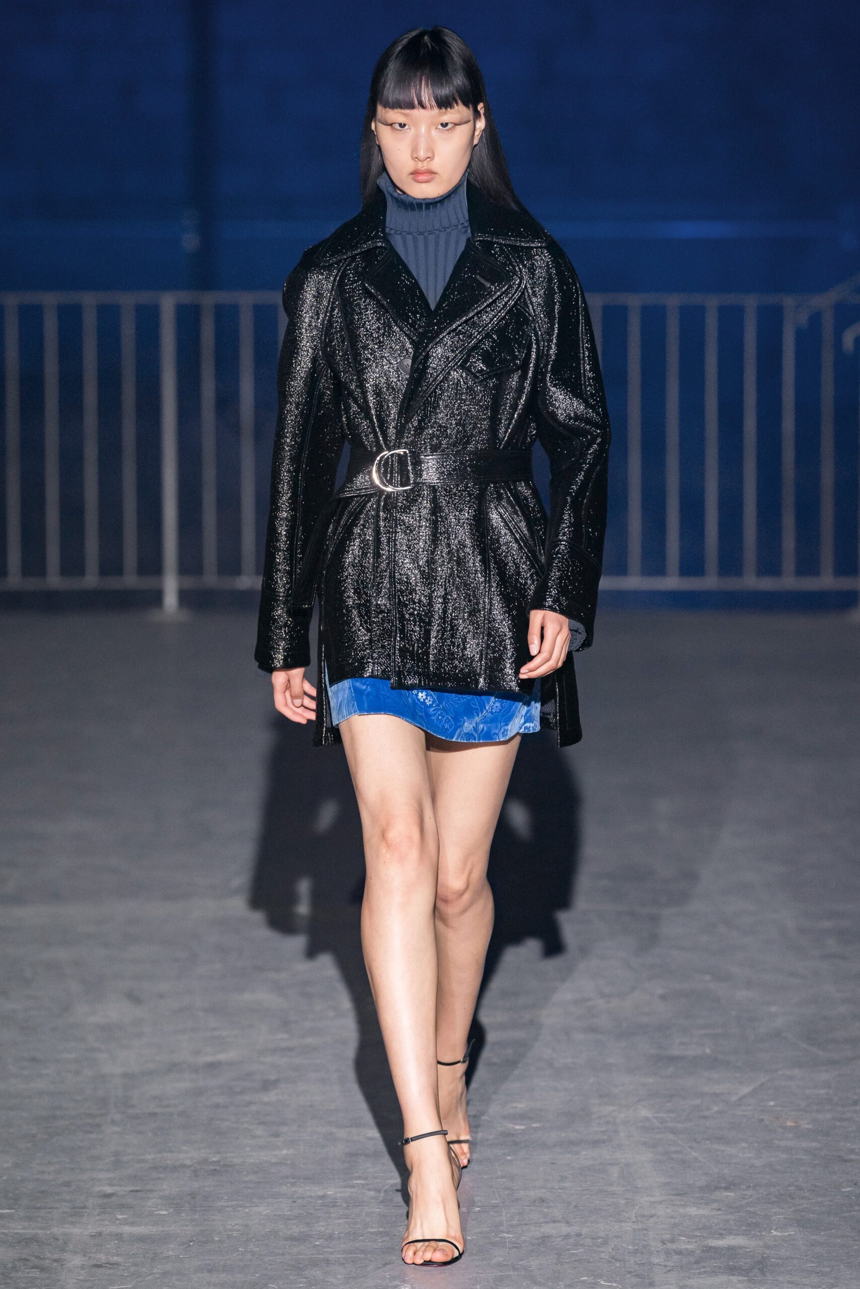 black vinyl long-sleeve collared fitted belted shiny coat