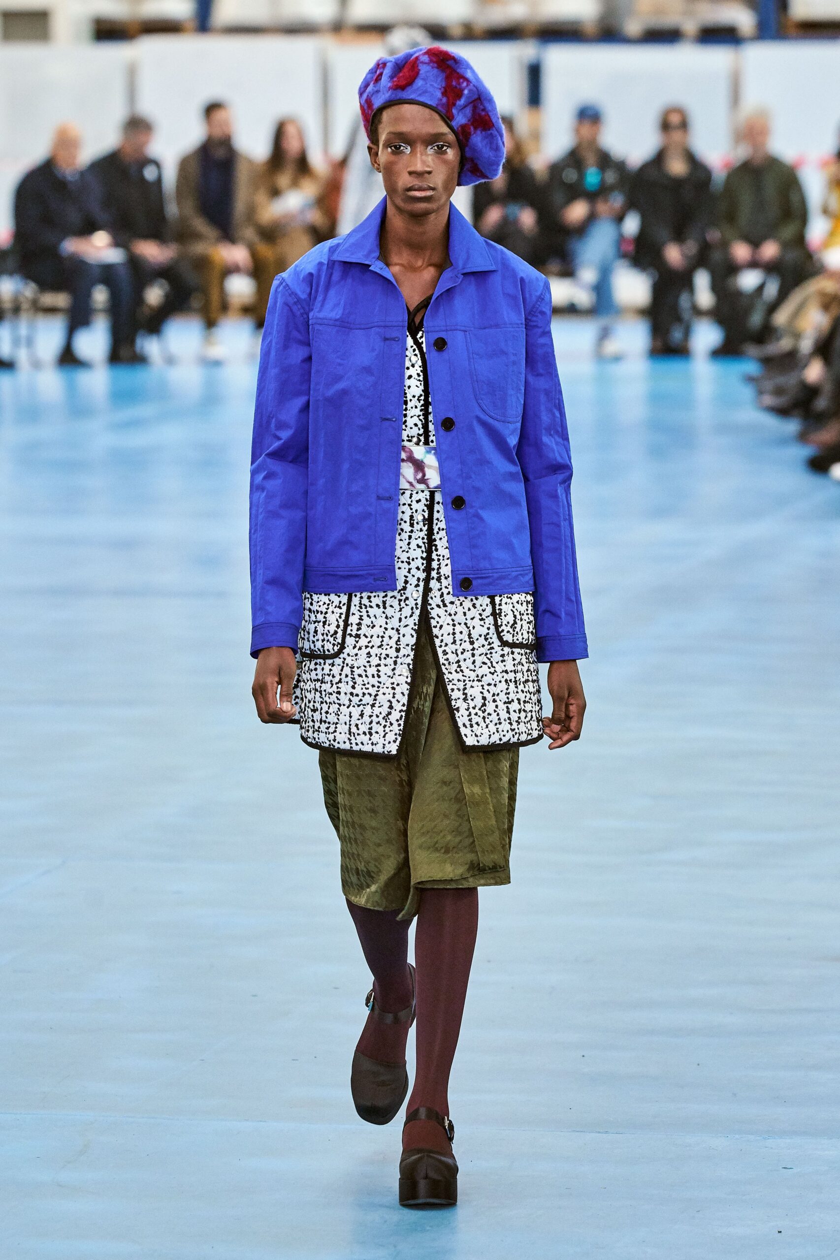 blue jacket with printed shirt