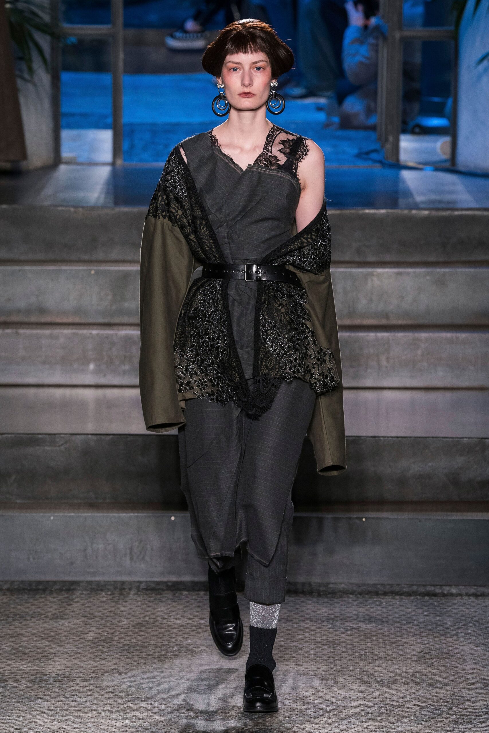 gray relaxed jumpsuit with green coat