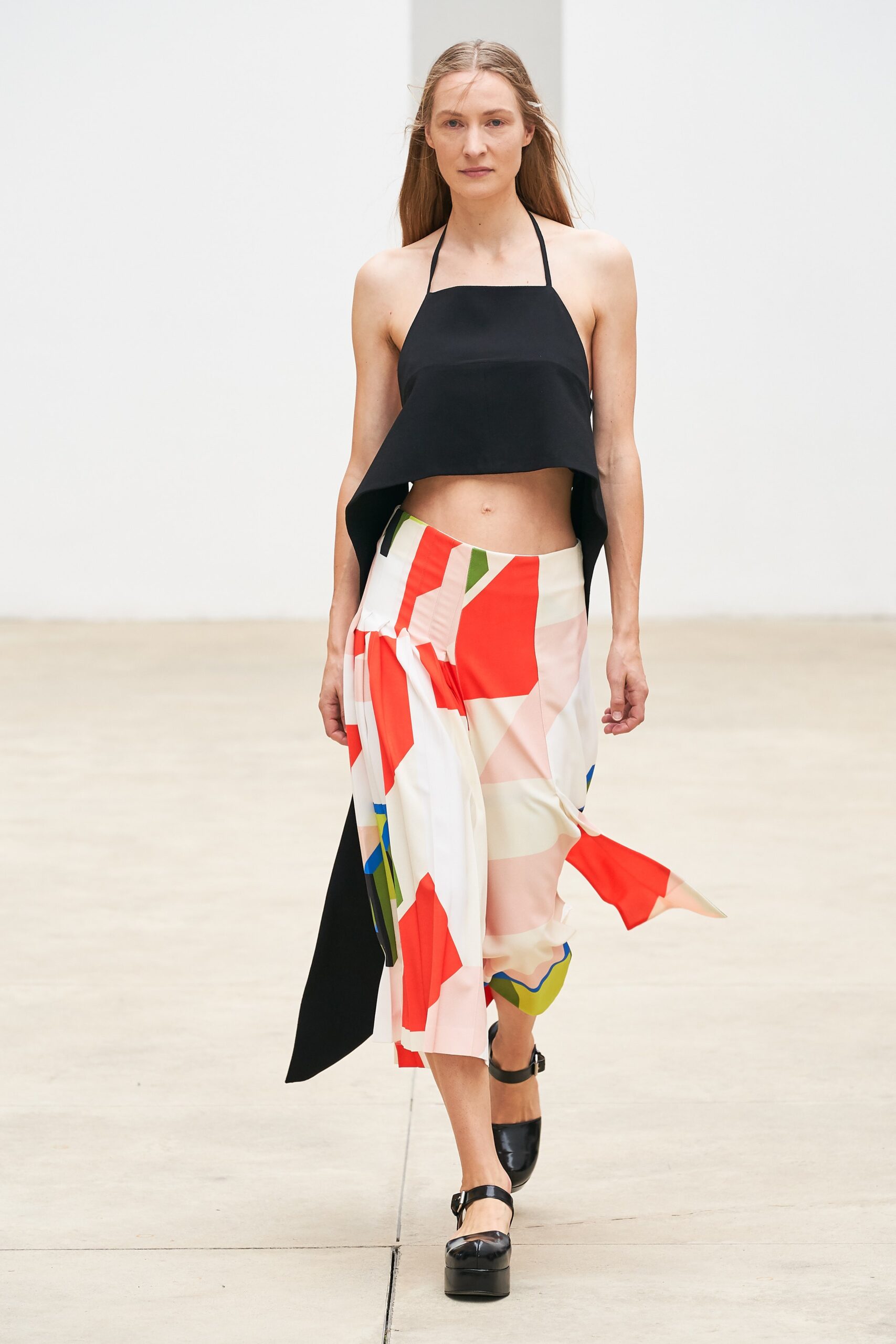 black halter top with colorful pants