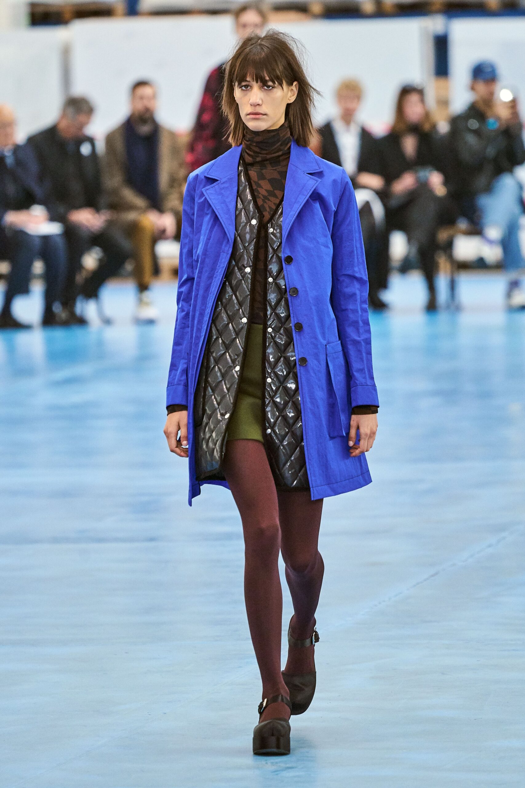 blue coat with green dress