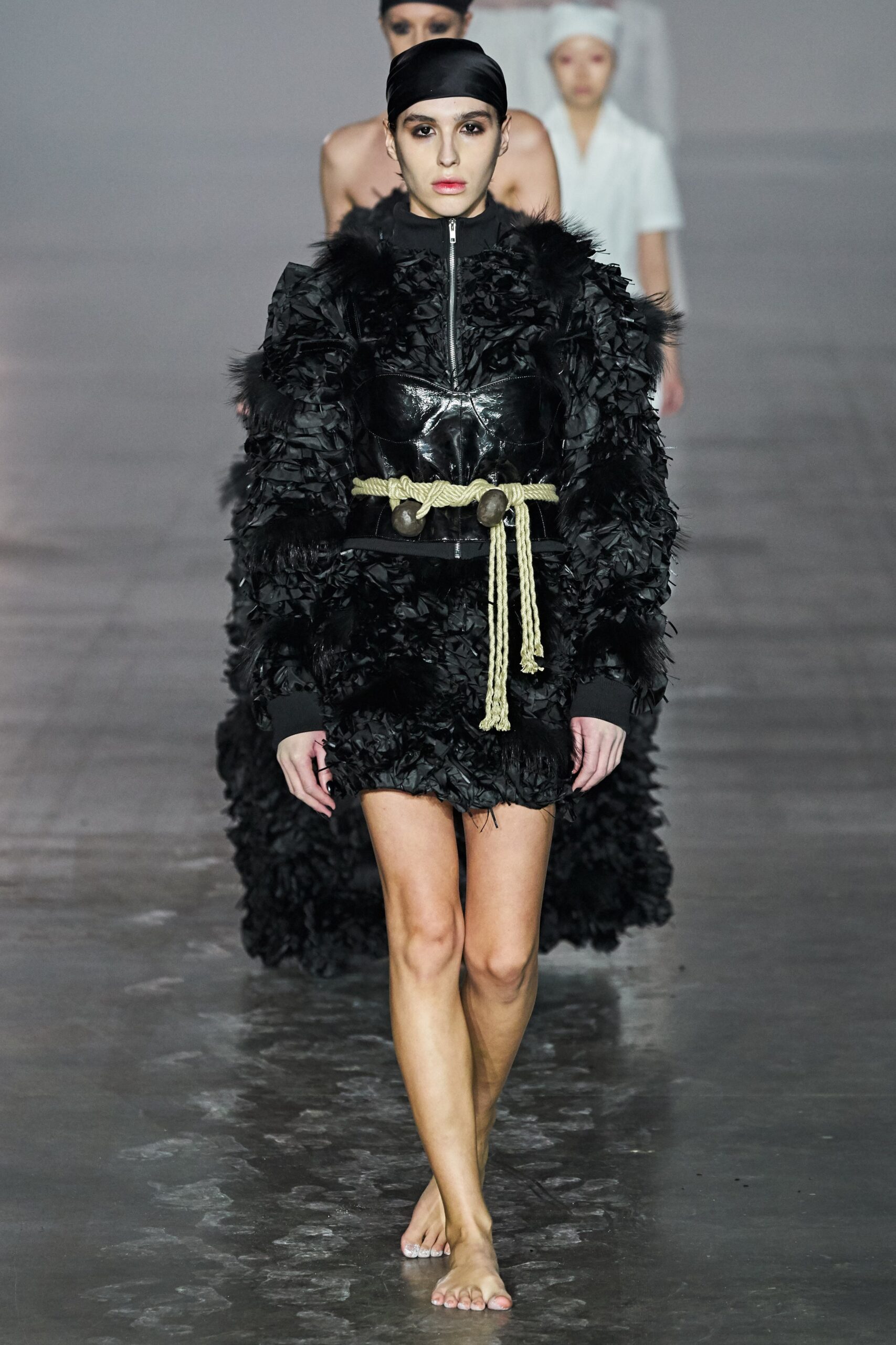 black fur mini dress with gold belt