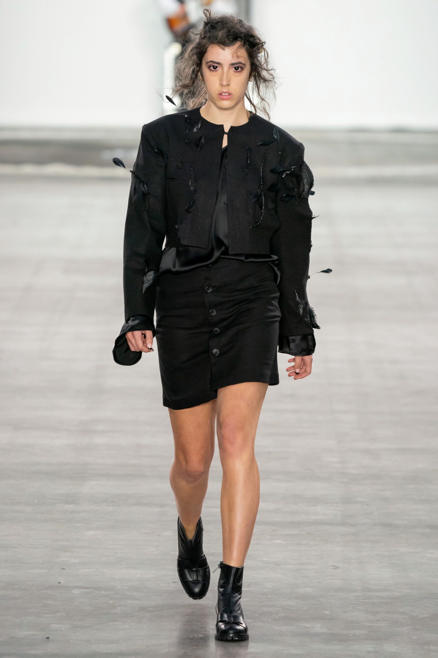 black fitted jacket and skirt