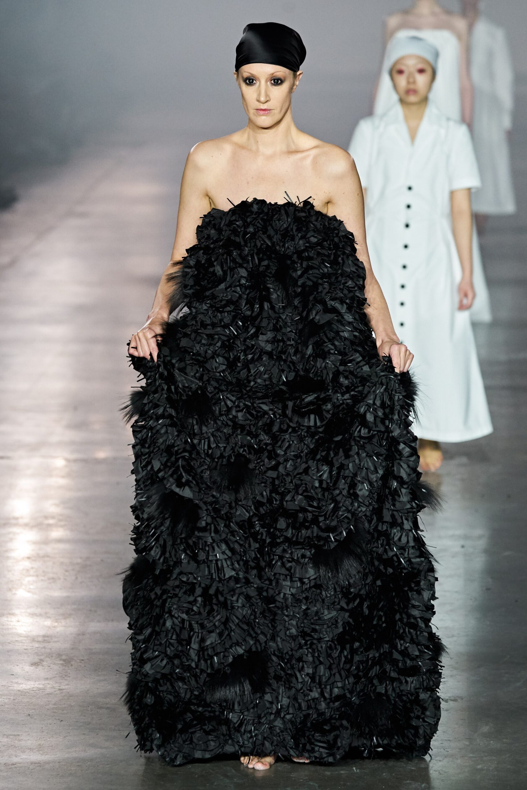 black ruffled strapless gown