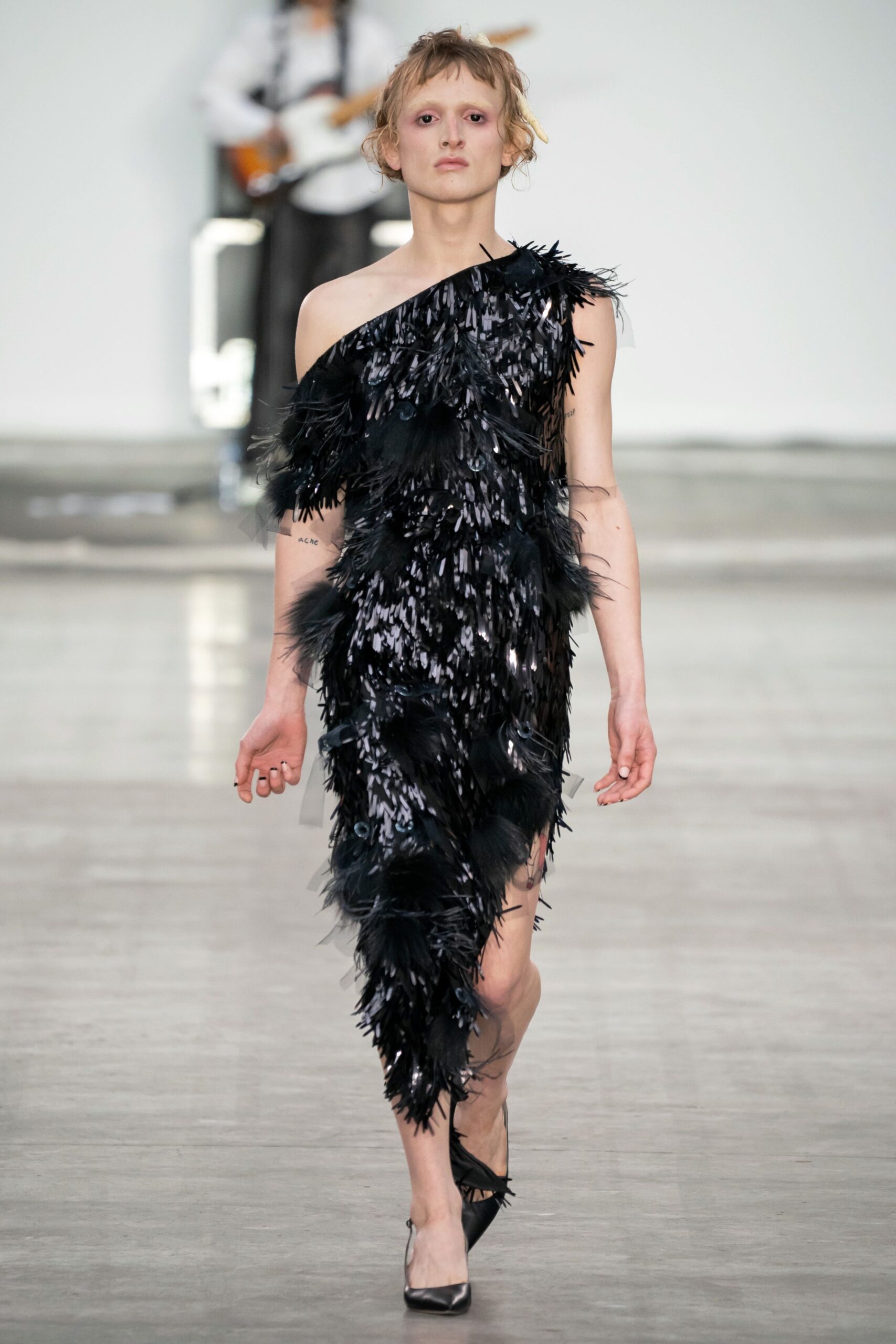 black feather asymmetric dress