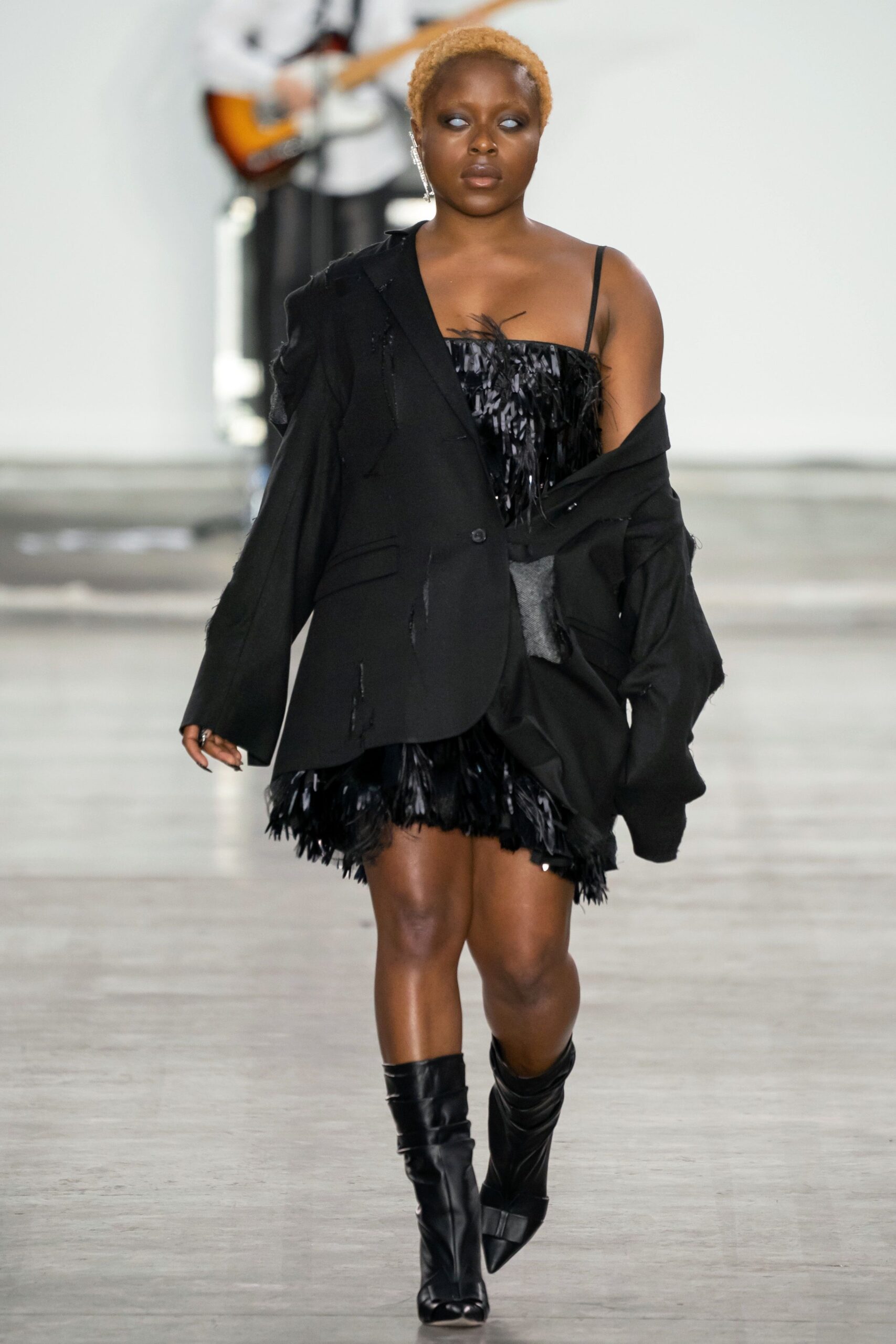 black cotton long-sleeve collared oversized distressed jacket