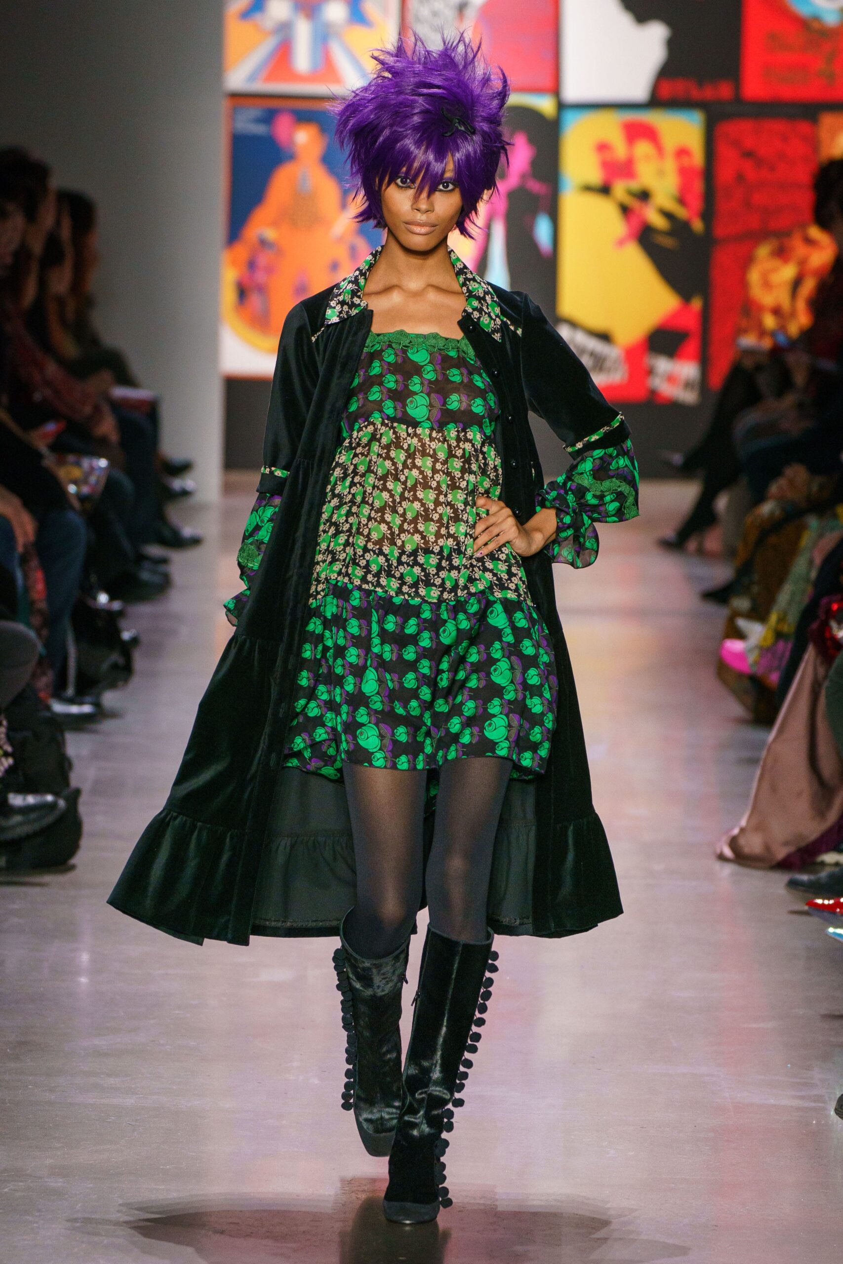 green flared mini dress with black coat