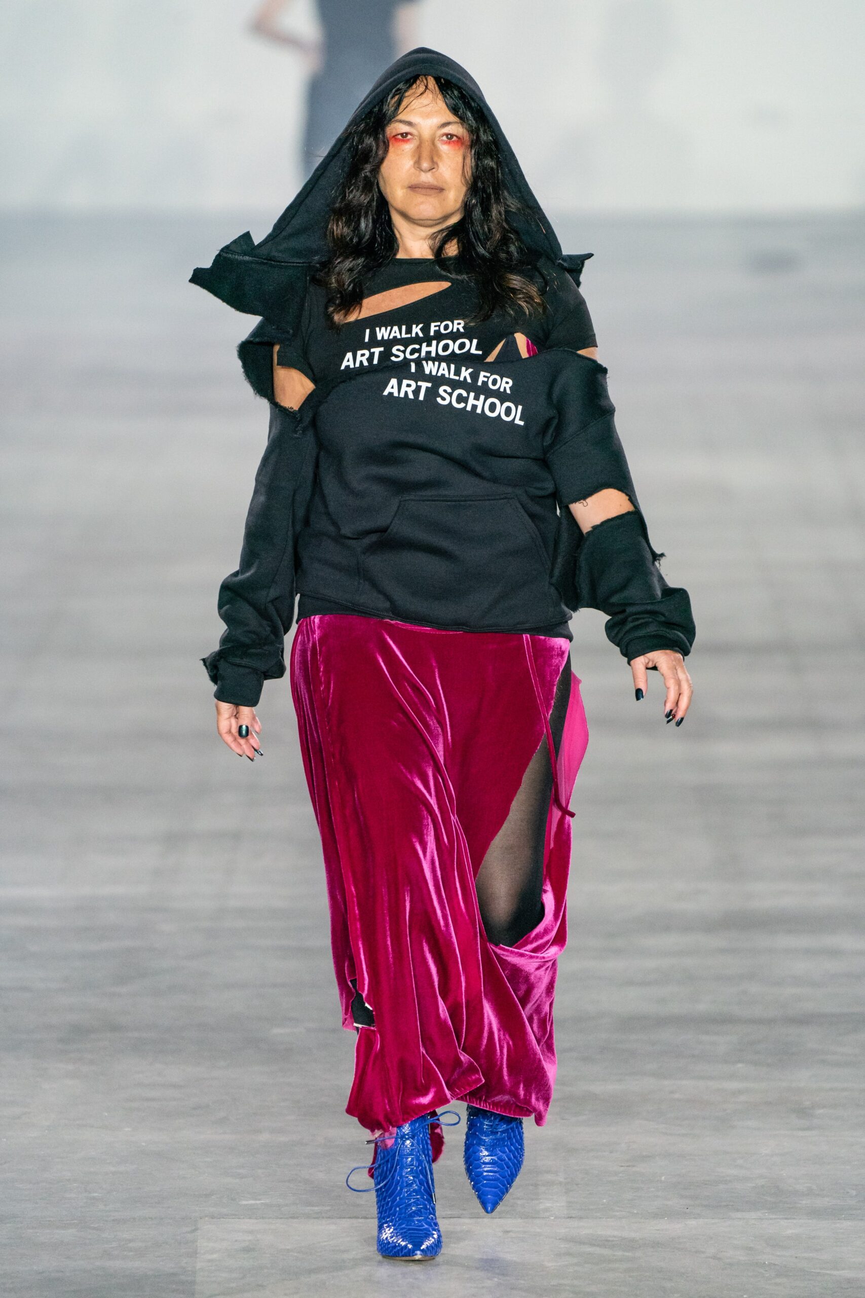 black hoodie and purple skirt