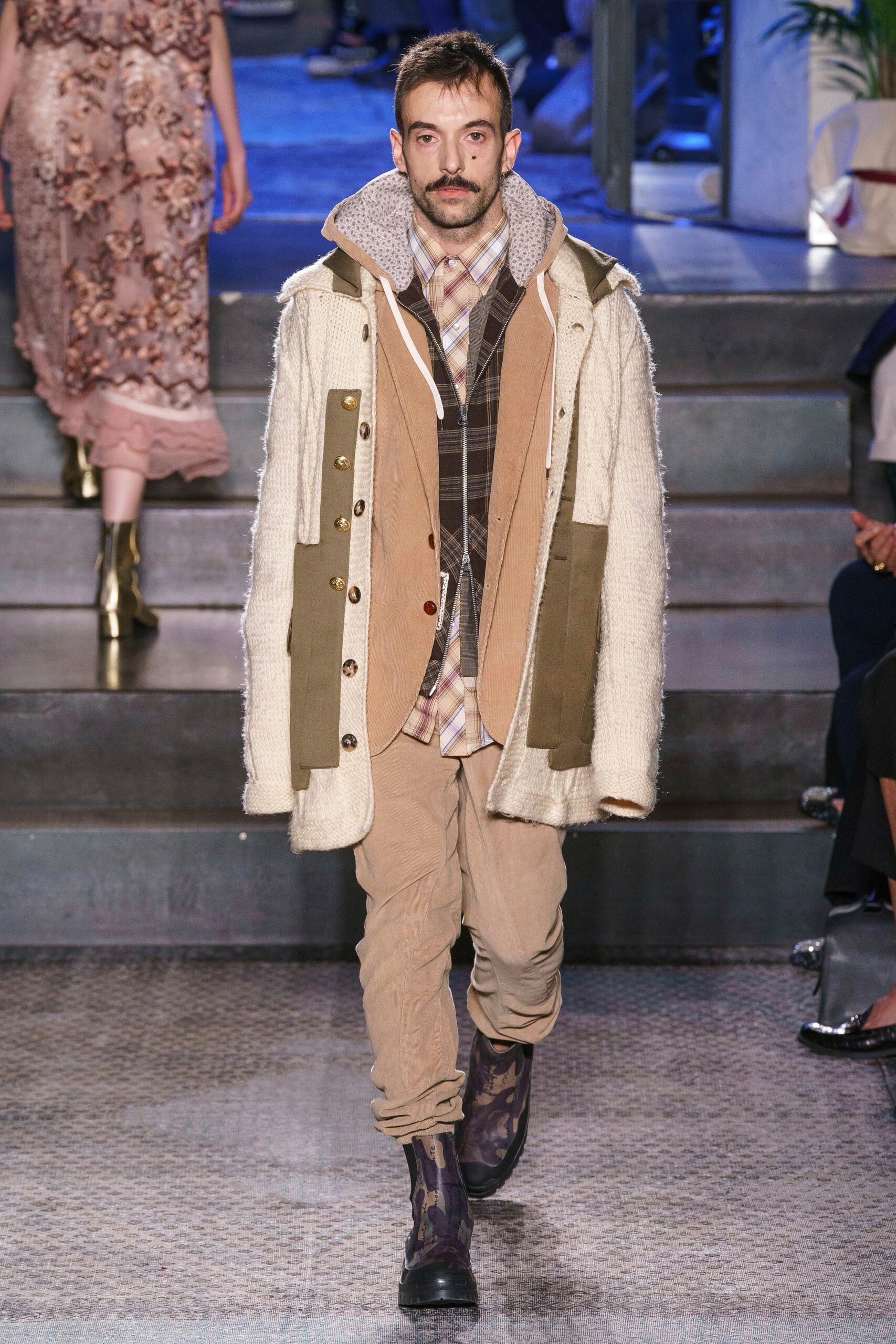 relaxed layered outfit with boots