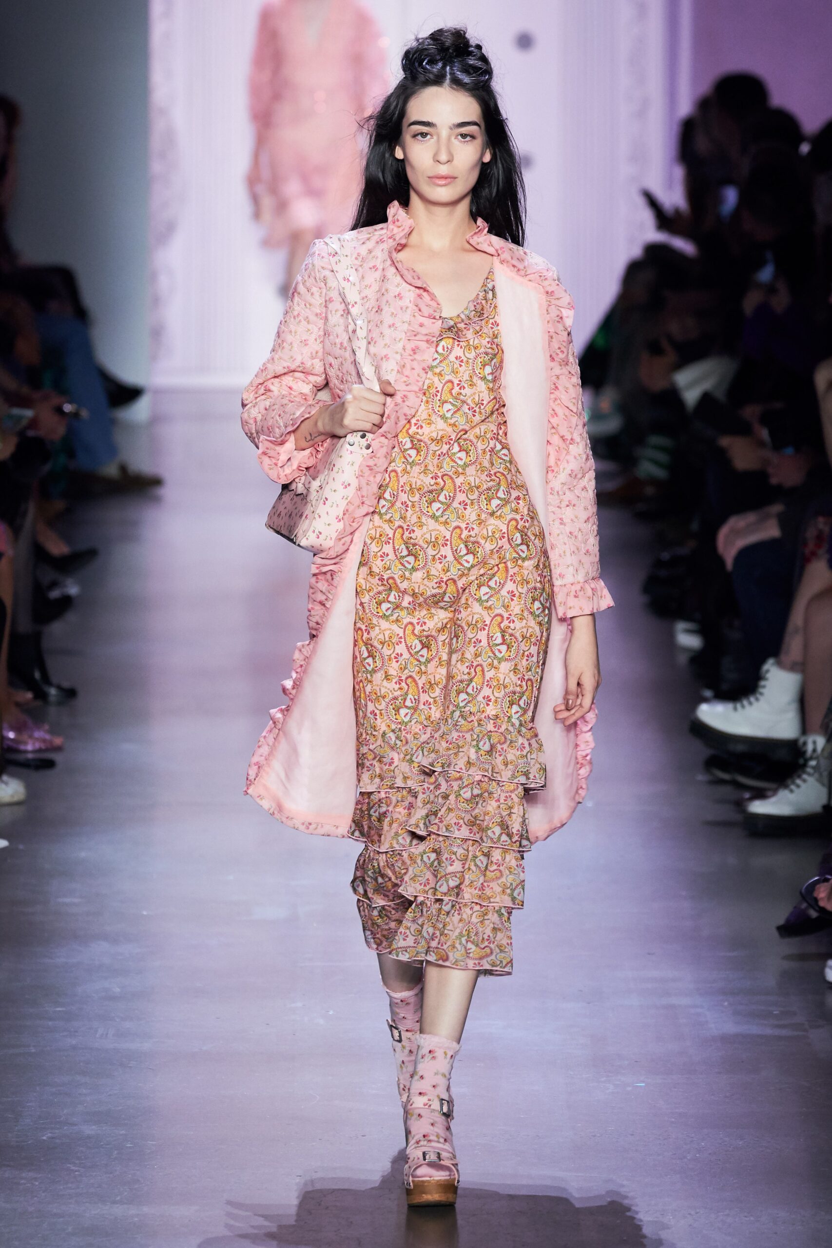 pink embroidered coat and yellow dress