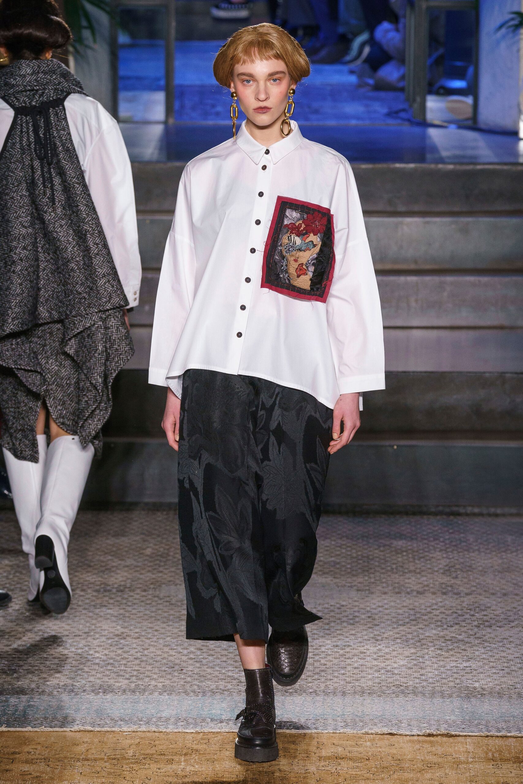 relaxed white shirt and black pants