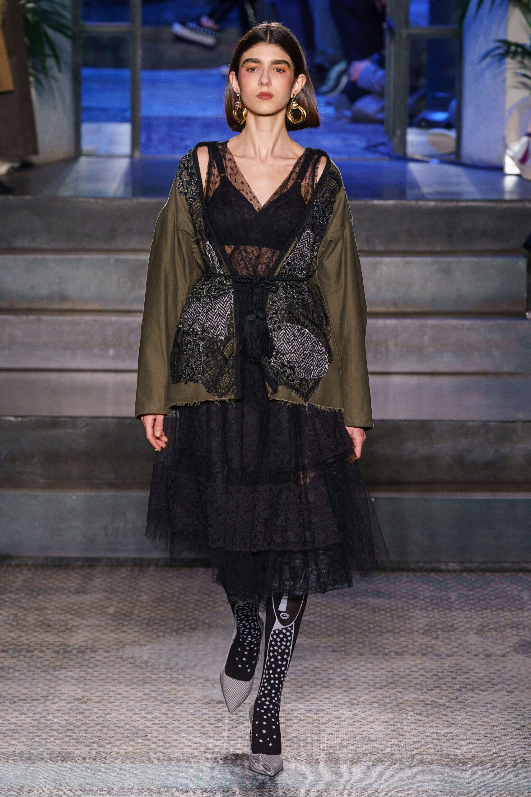 black lace midi dress with green jacket