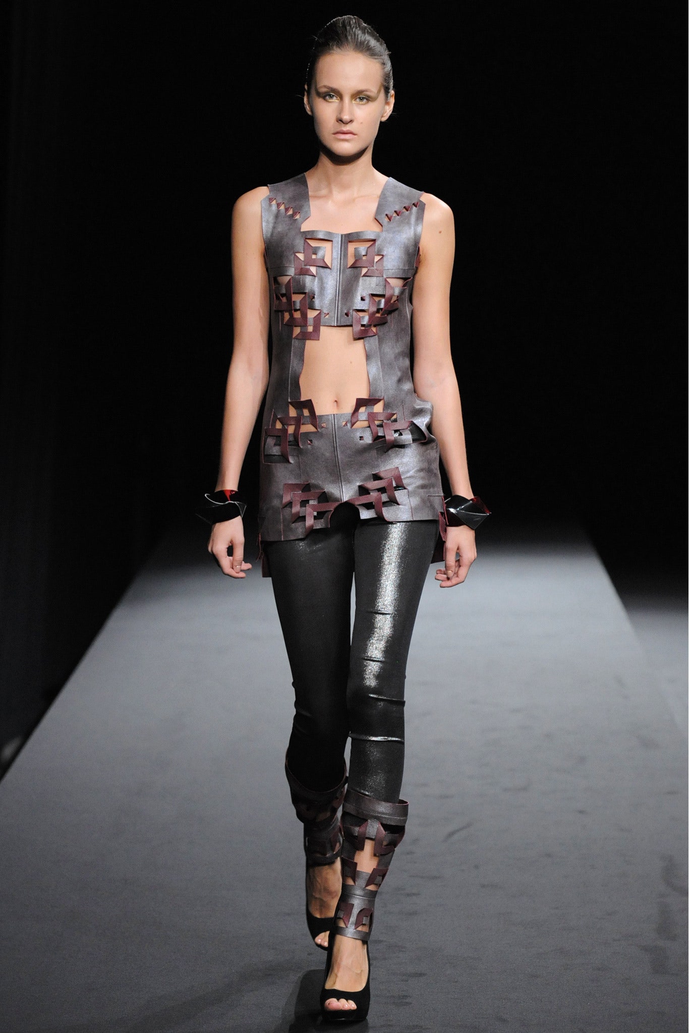 fitted gray leather top and black pants