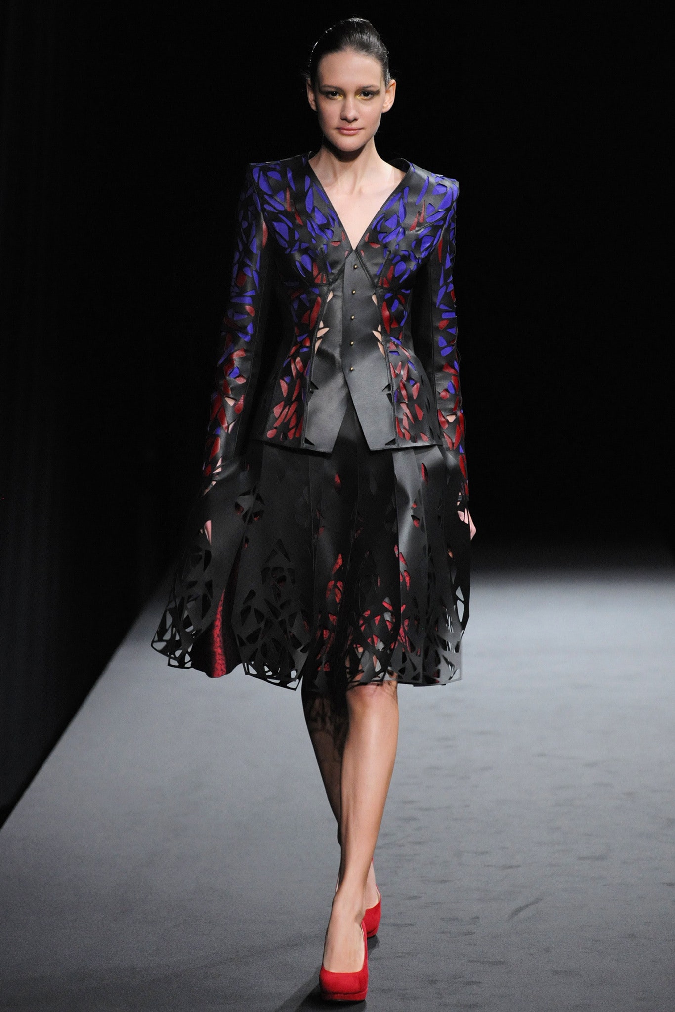 tailored black blazer and midi skirt