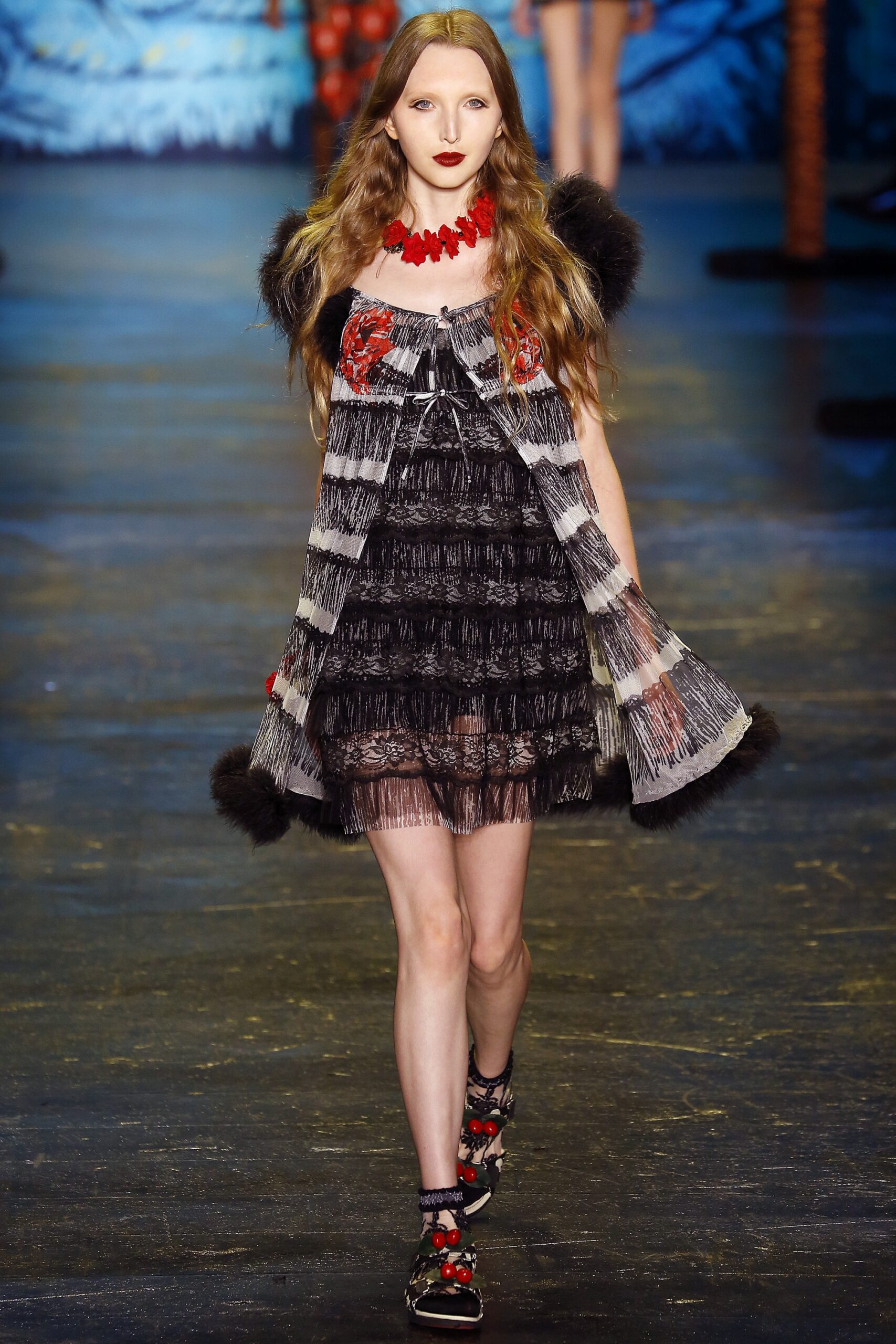 black and white tiered dress with cape