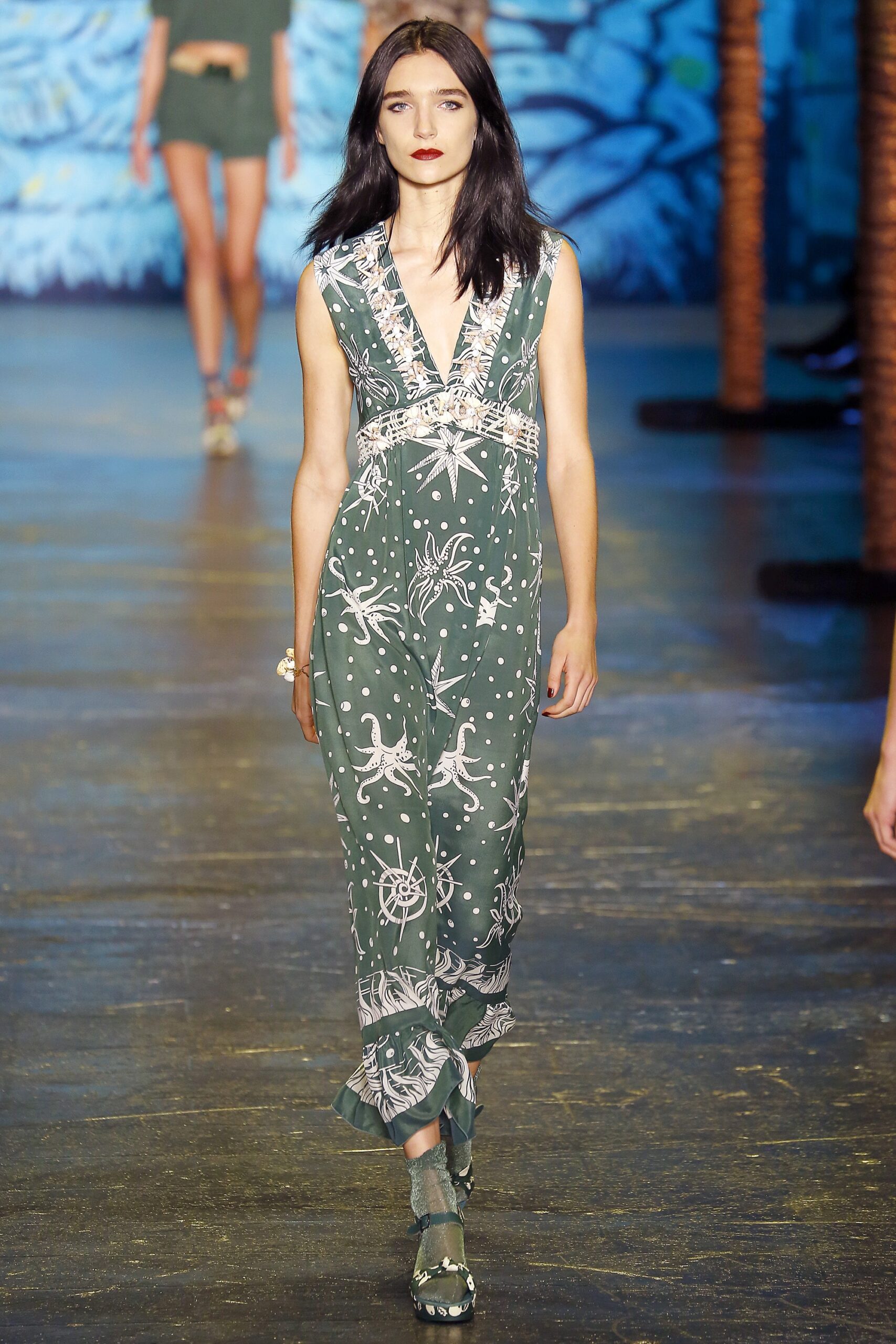 green printed sleeveless jumpsuit