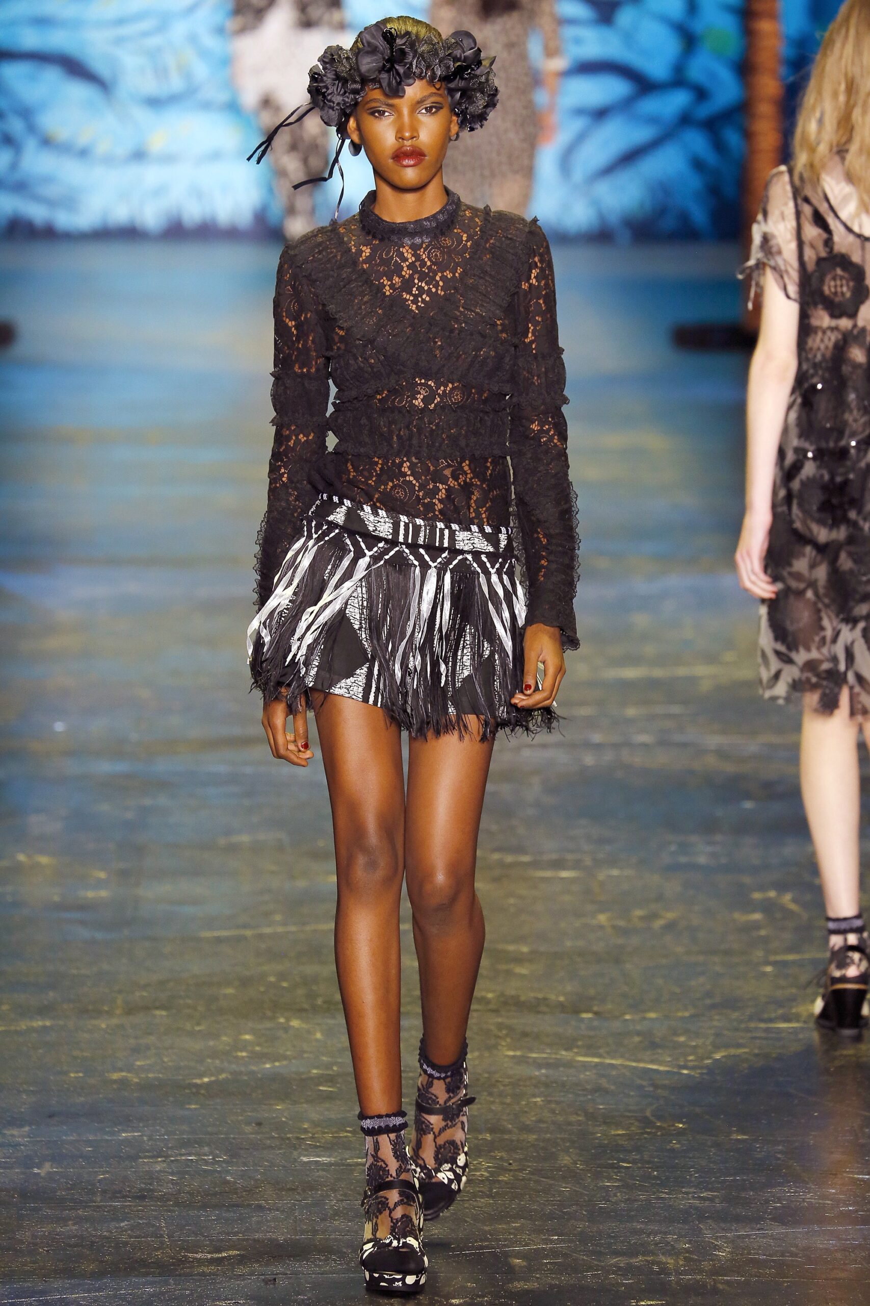 black lace top with mini skirt