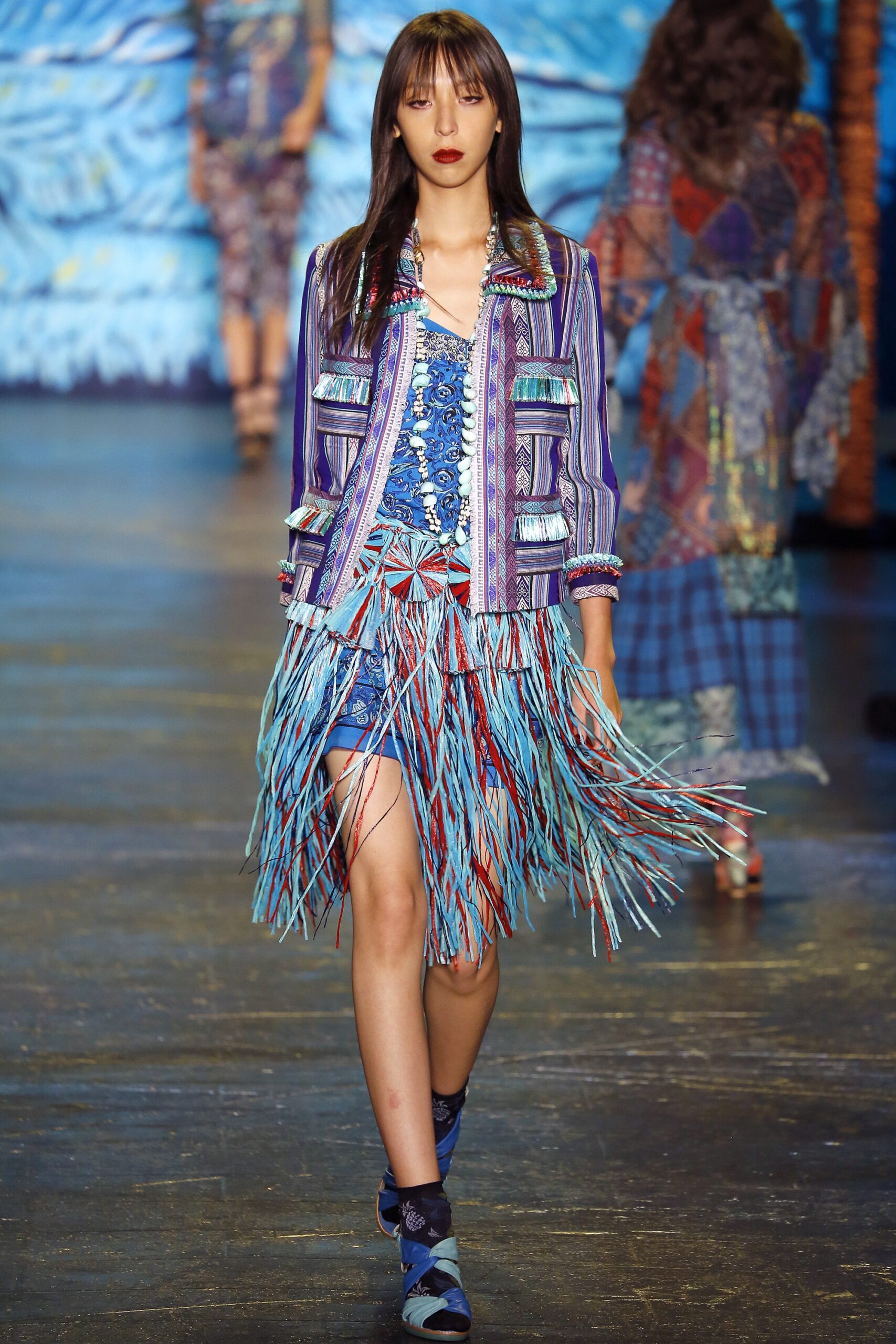 fringed blue jacket and top