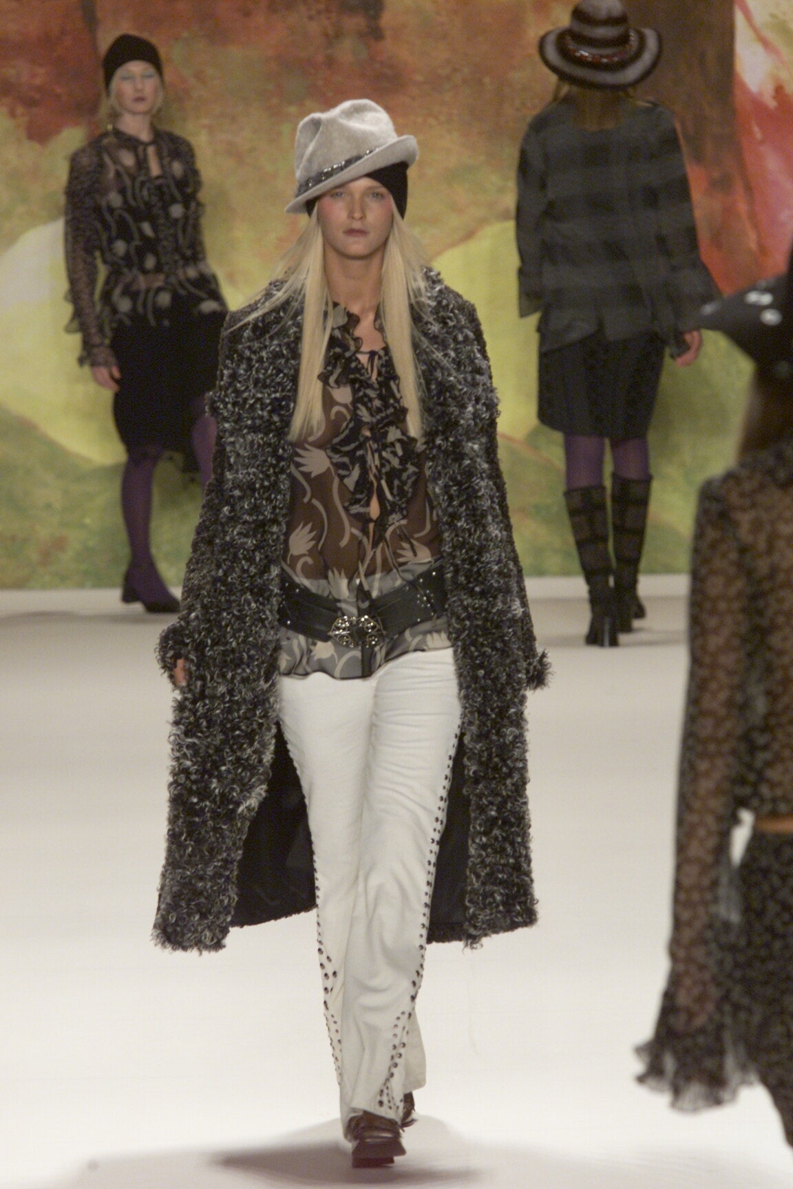 relaxed black fur coat with printed blouse