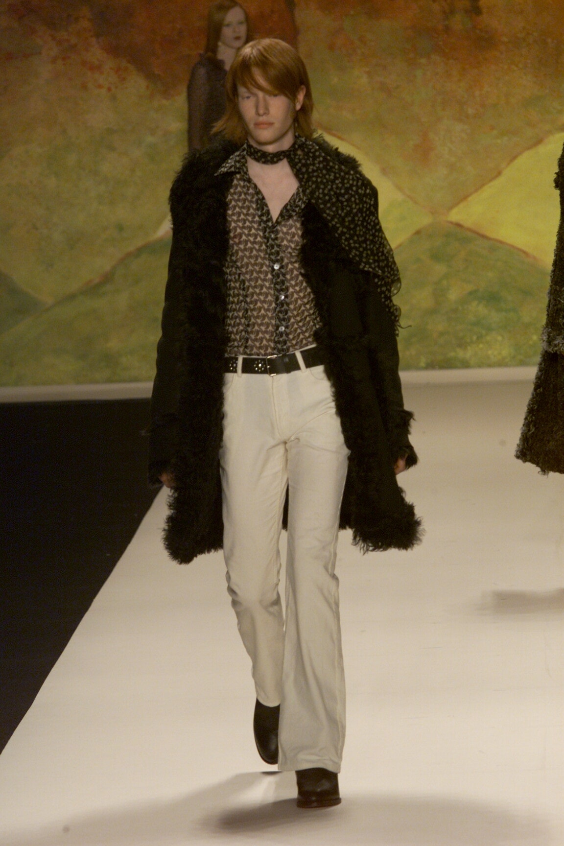 black faux-fur coat with printed shirt