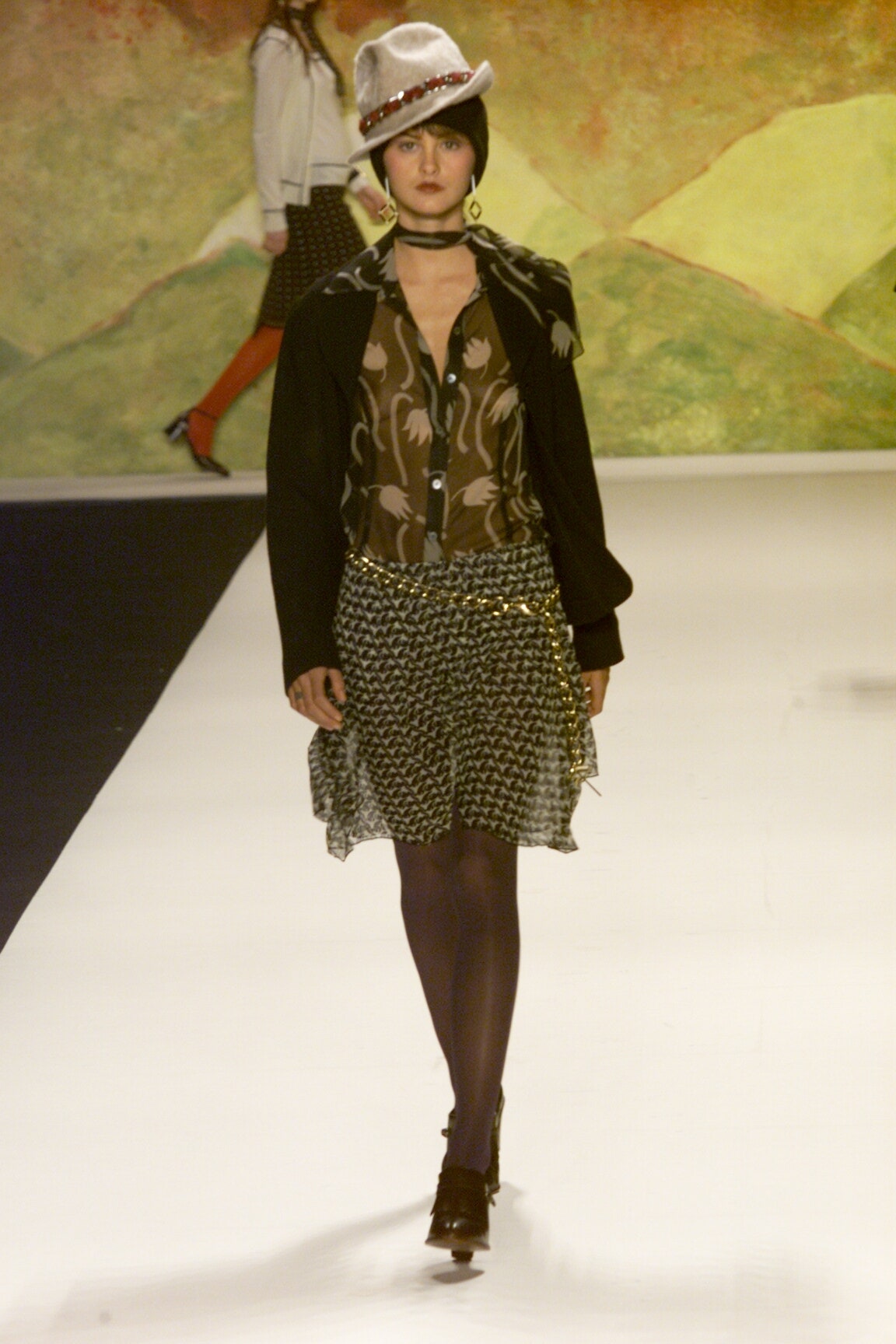 fitted brown blouse with mini skirt