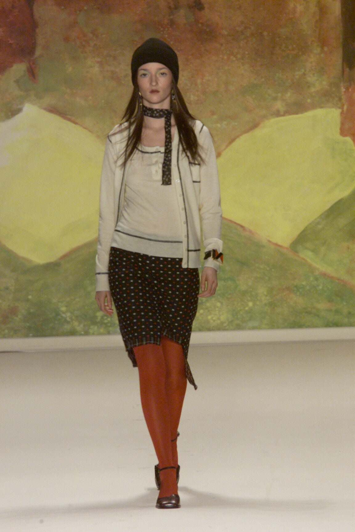 beige cardigan with polka-dot skirt