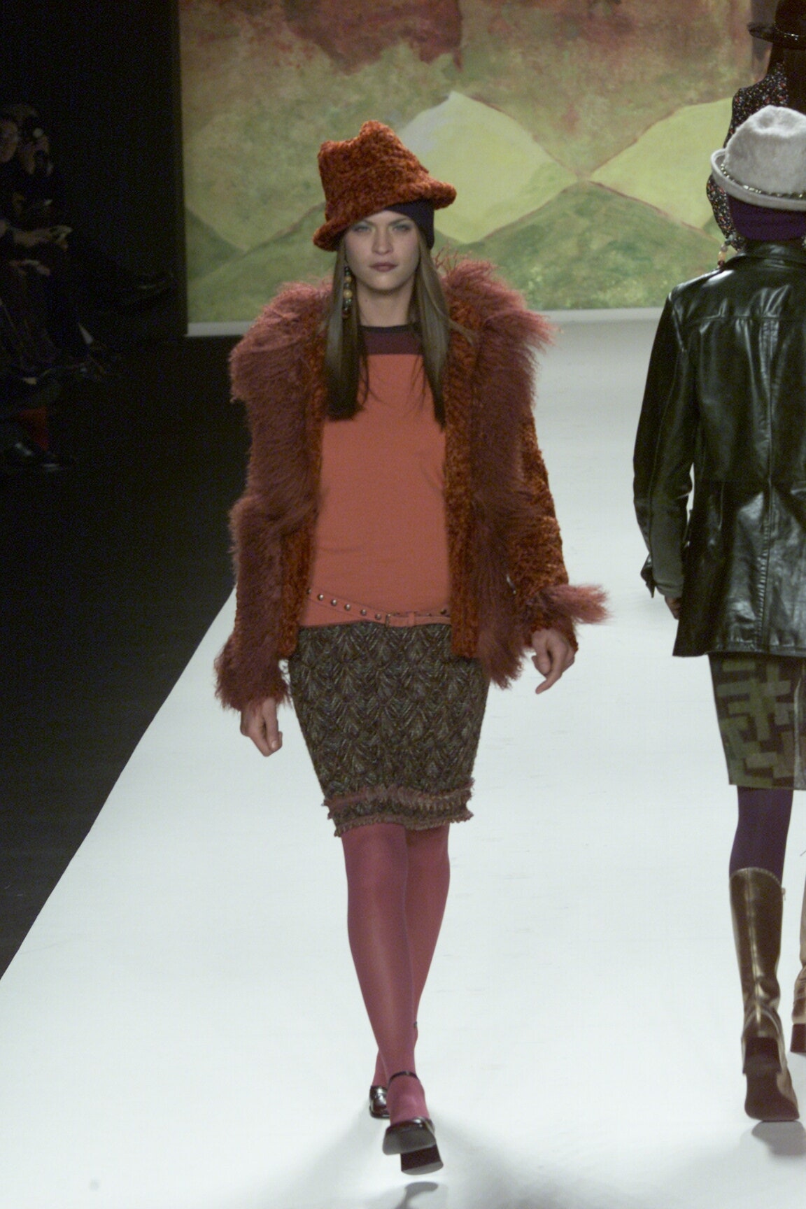 orange faux-fur coat with red top