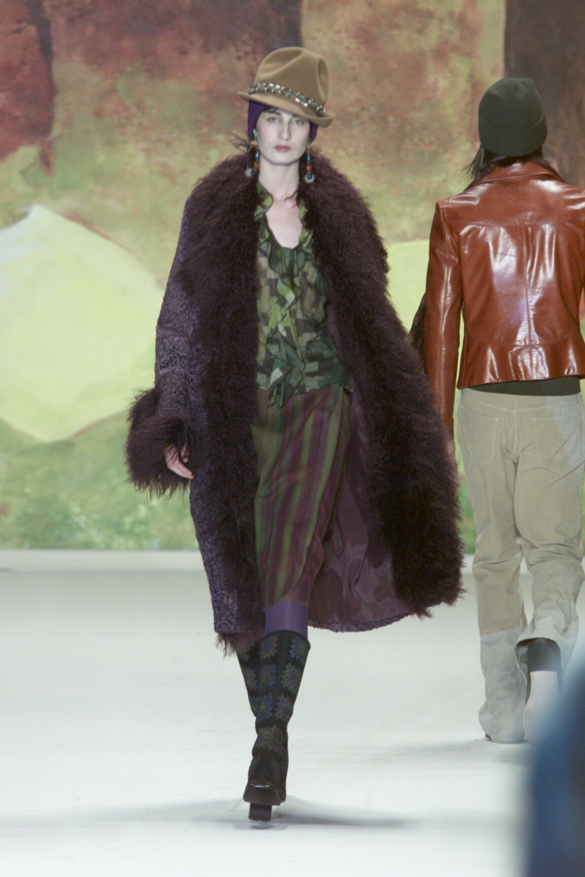 purple fur coat and green dress