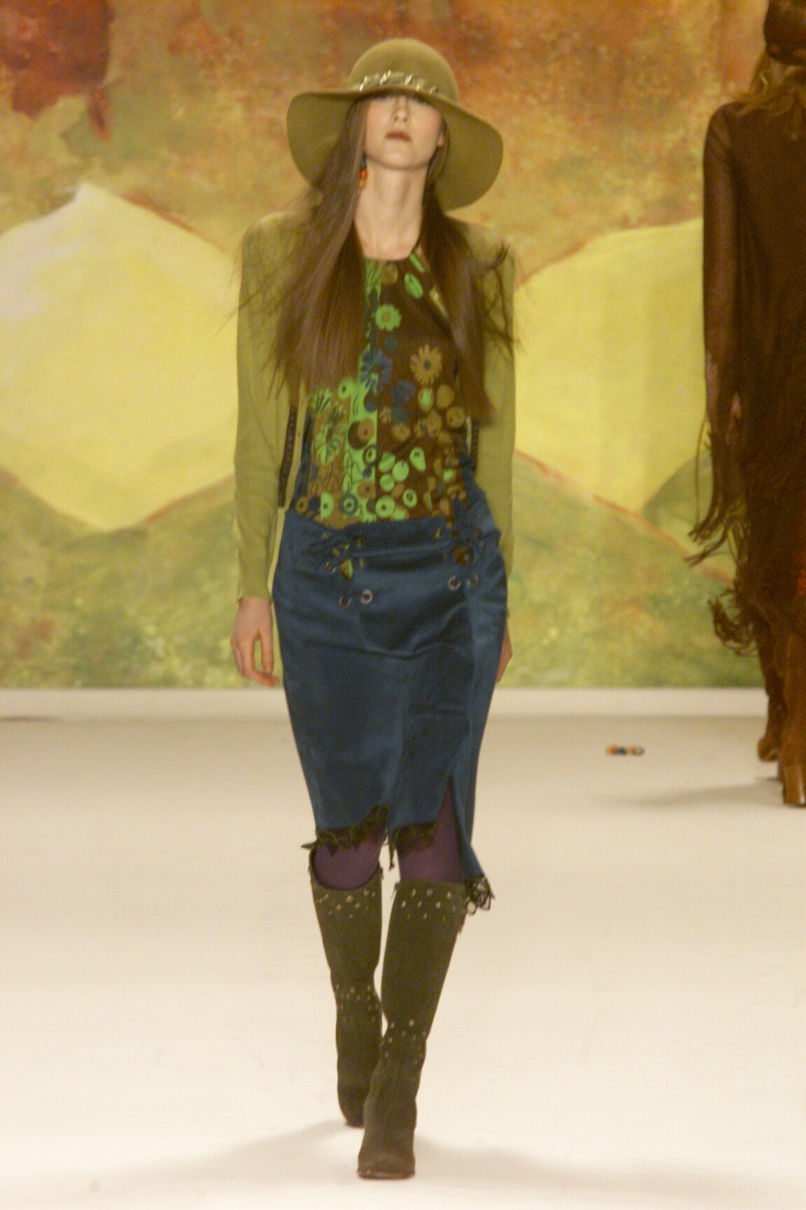 green printed top with blue skirt