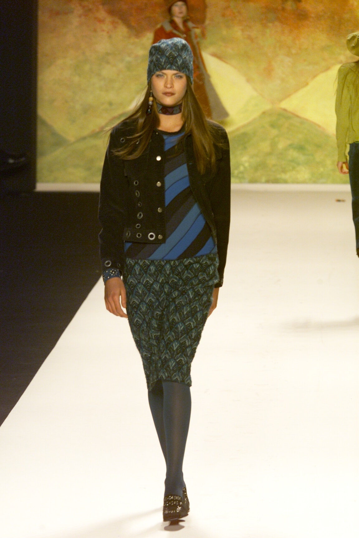 black fitted jacket with blue top