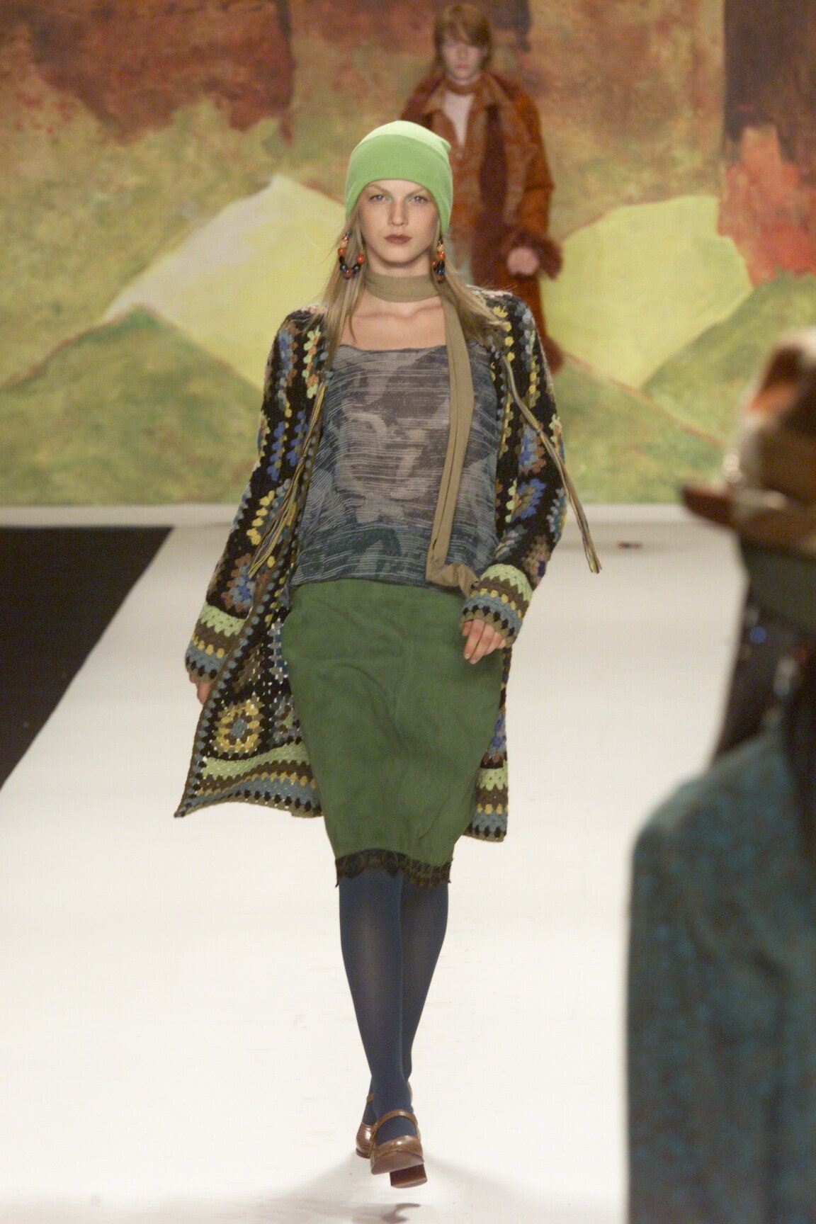 multi-colored cardigan with fitted top and pencil skirt