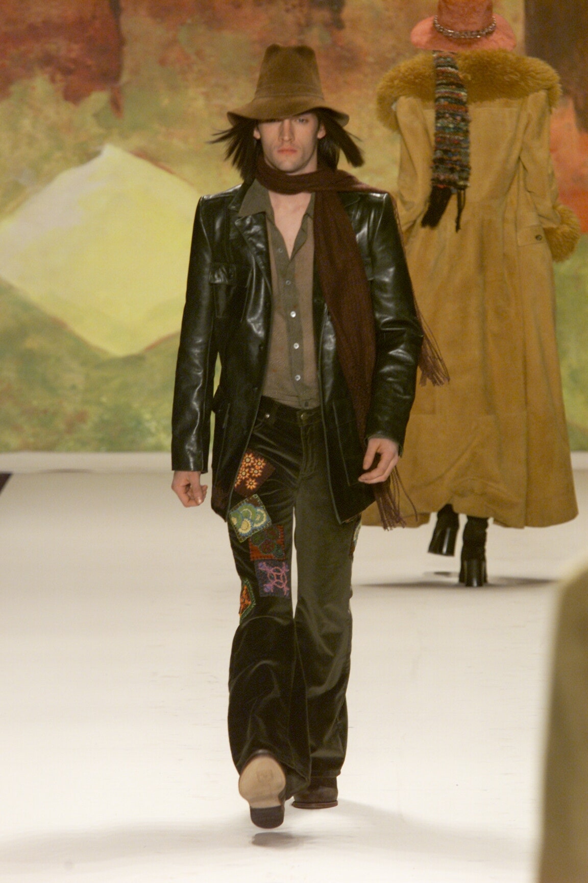 black leather jacket with flared pants