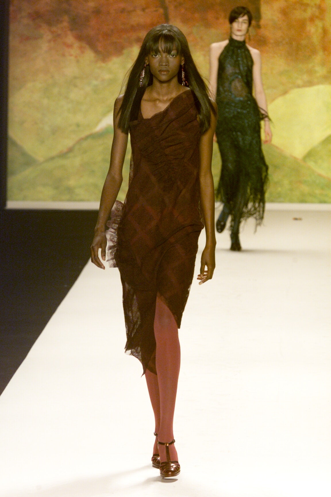 brown silk asymmetric dress with red pants