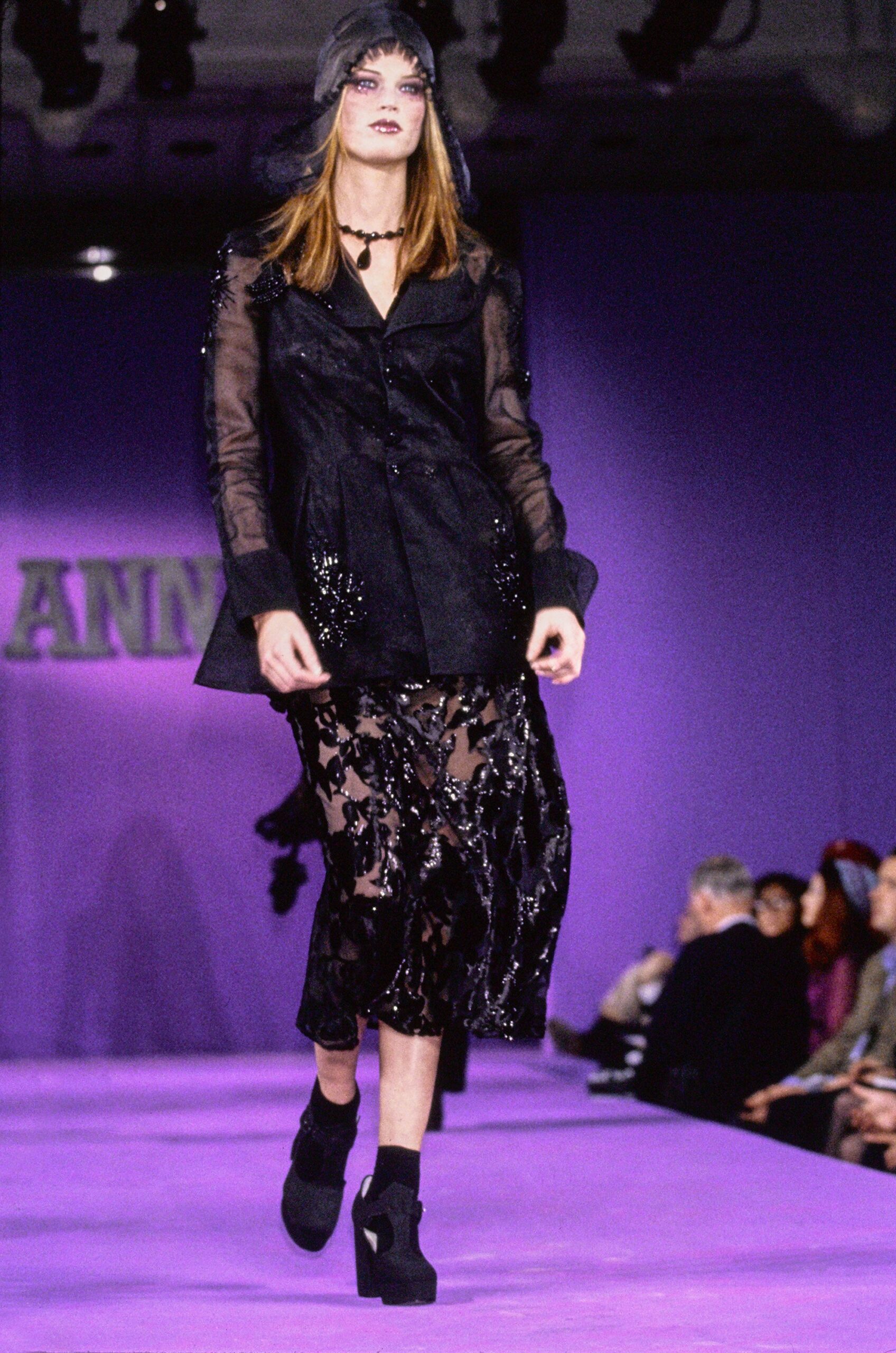 black sheer blazer and skirt