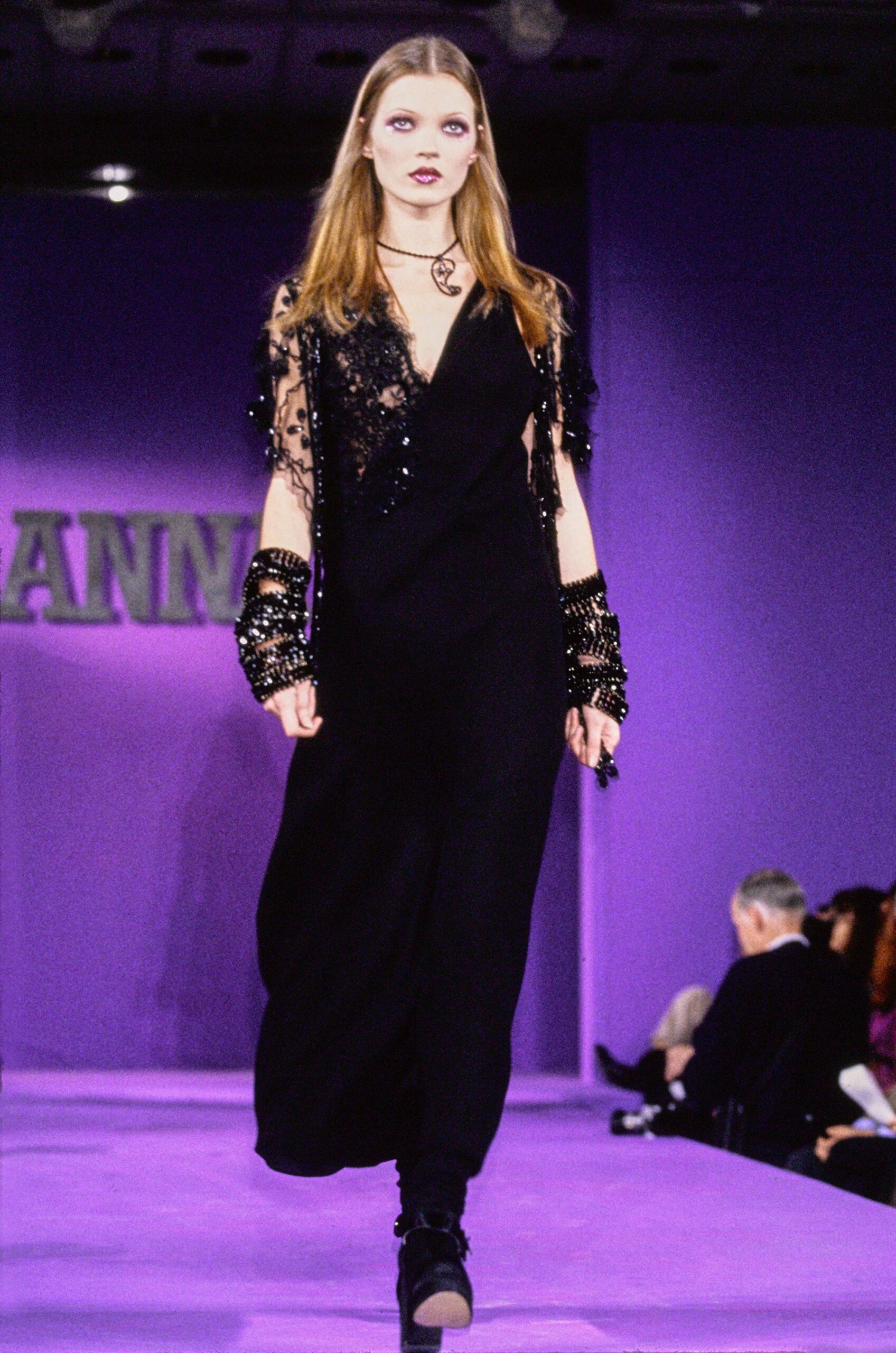 black silk fitted dress with cape