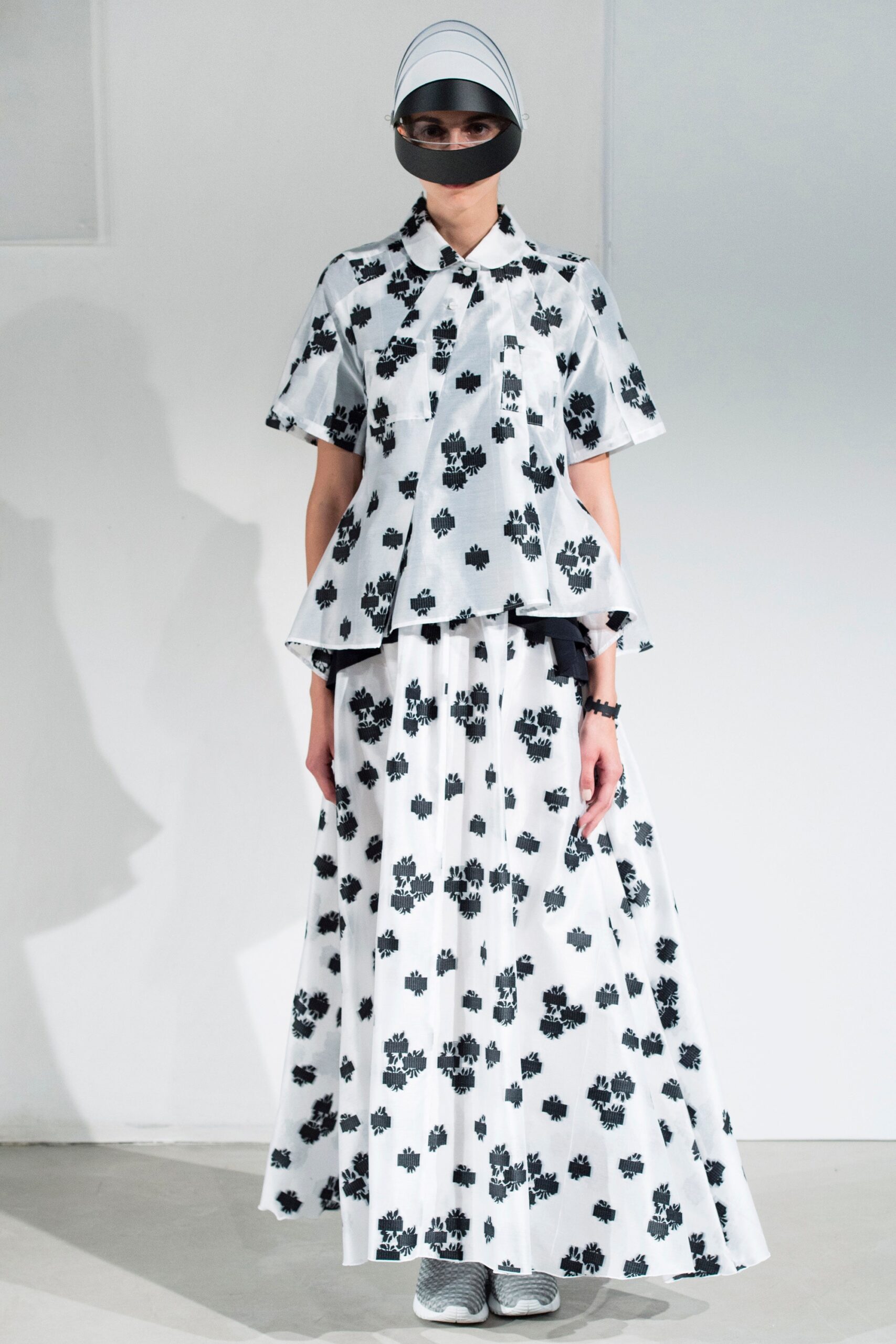 white and black printed top and skirt